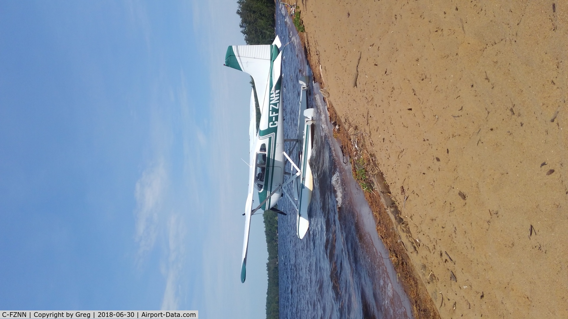 C-FZNN, 1970 Cessna A185E Skywagon 185 C/N 18501830, On the beach at lake clear ny.