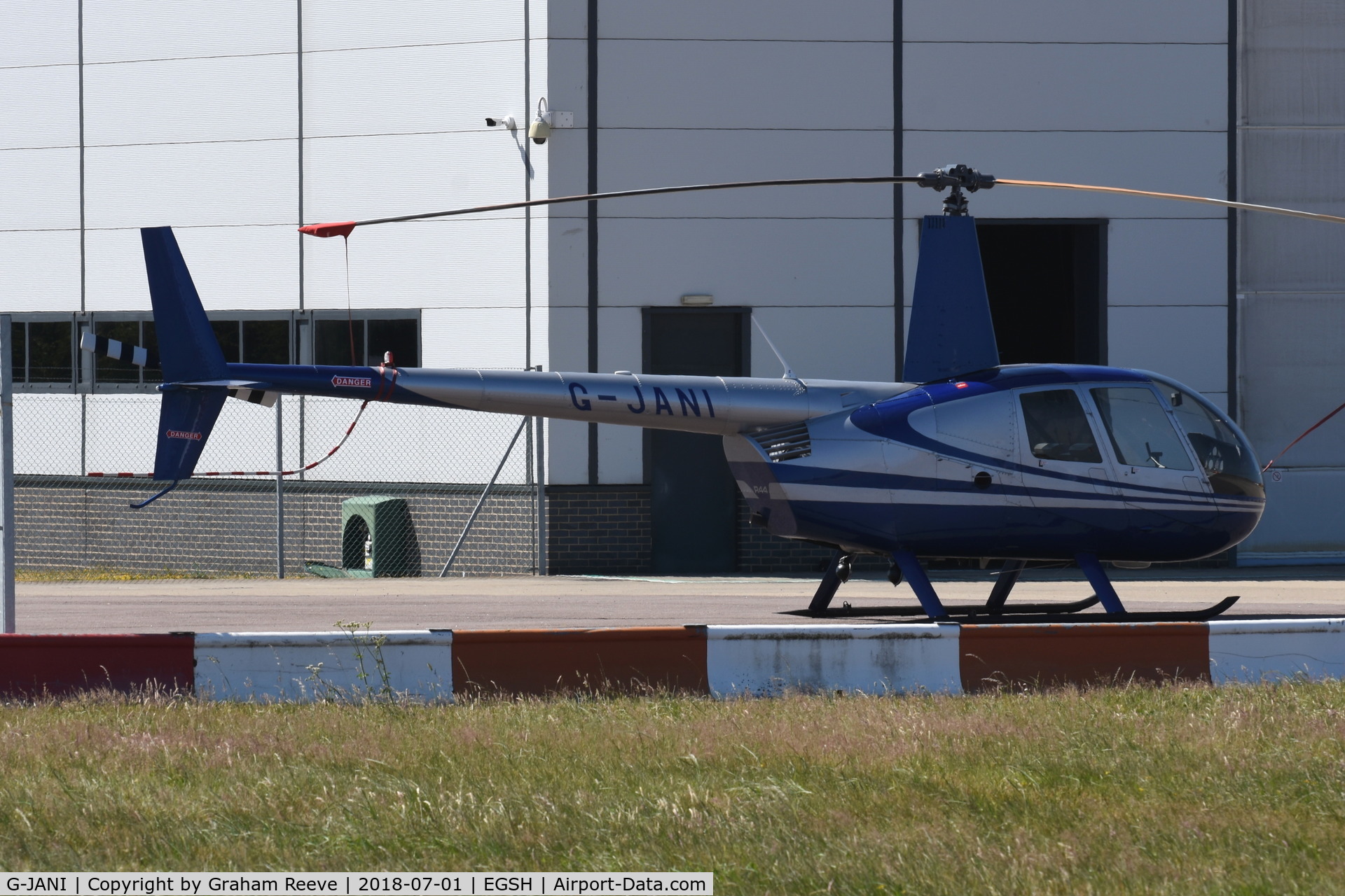 G-JANI, 1994 Robinson R44  Raven II C/N 0110, Parked at Norwich.