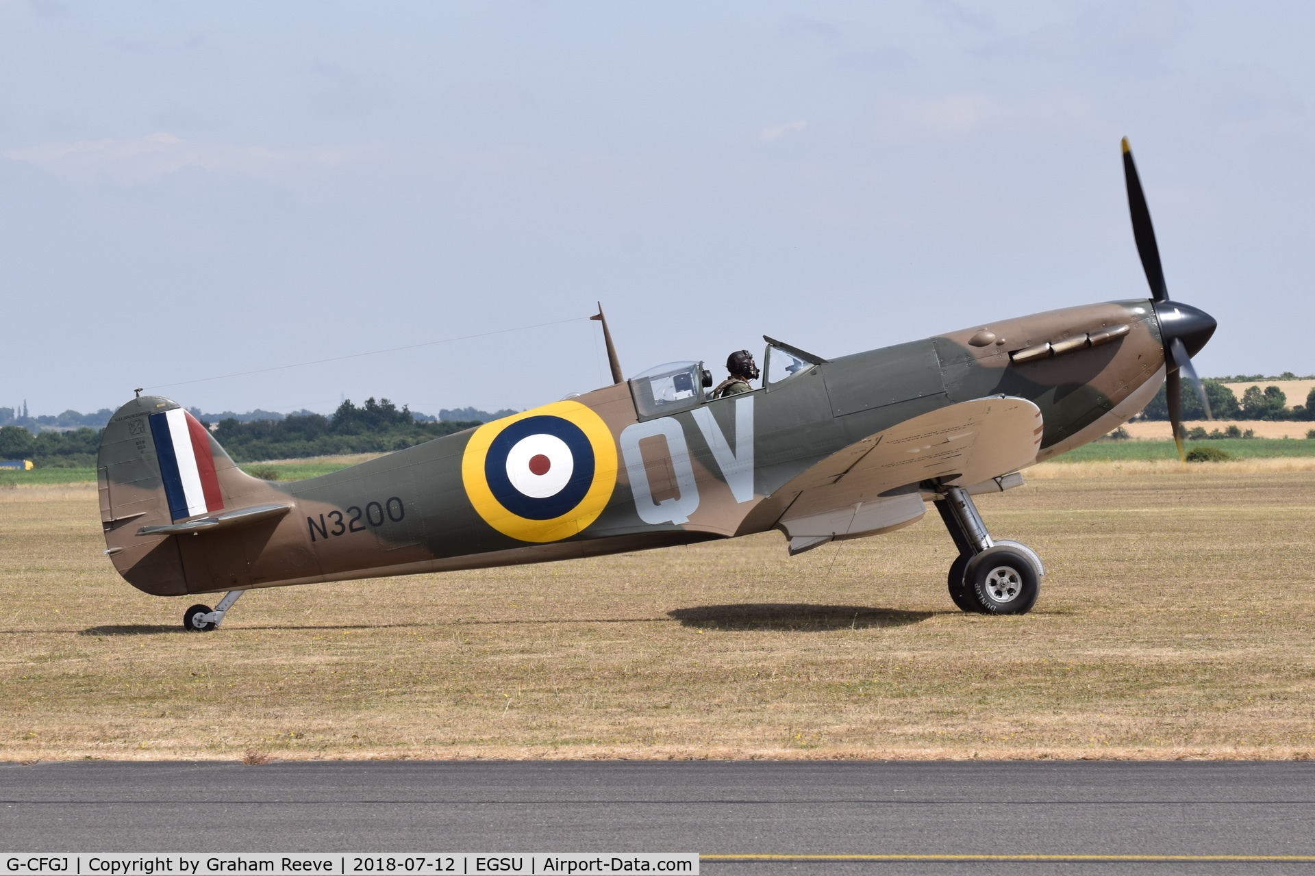 G-CFGJ, 1939 Supermarine Spitfire 1 C/N 441, About to depart from Duxford.
