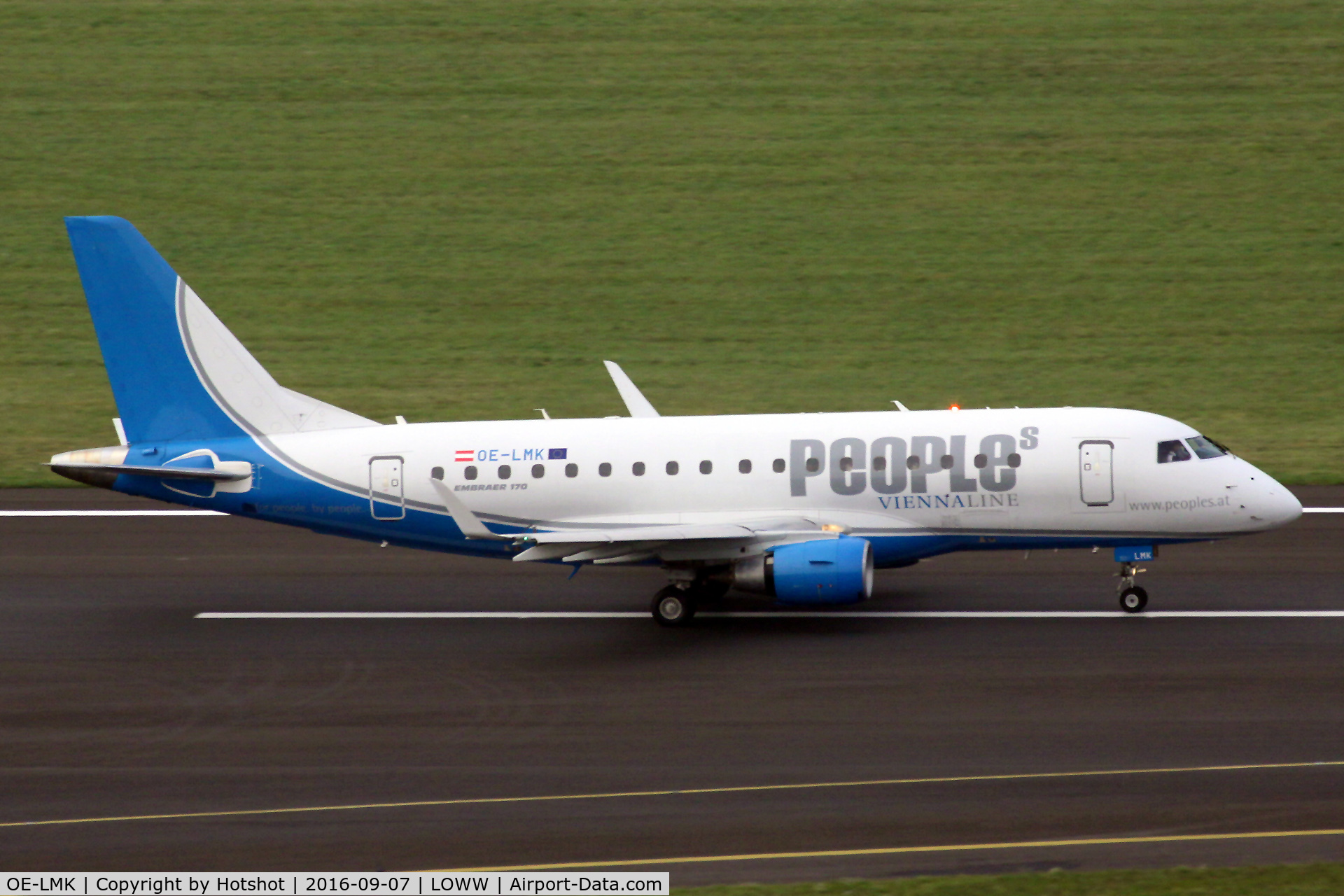 OE-LMK, 2006 Embraer 170LR (ERJ-170-100LR) C/N 17000150, Departing runway 29 with a beacon flash