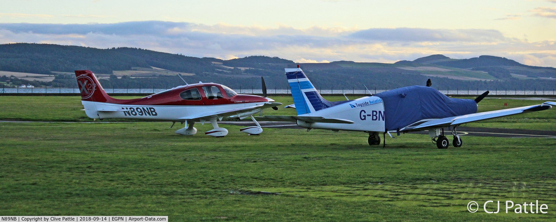 N89NB, Cirrus SR22X C/N 3680, Parked up at Dundee alongside a resident PA-28