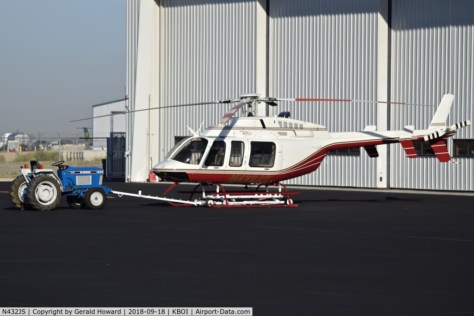 N432JS, 2011 Bell 407 C/N 54320, Parked at a northeast hangar.