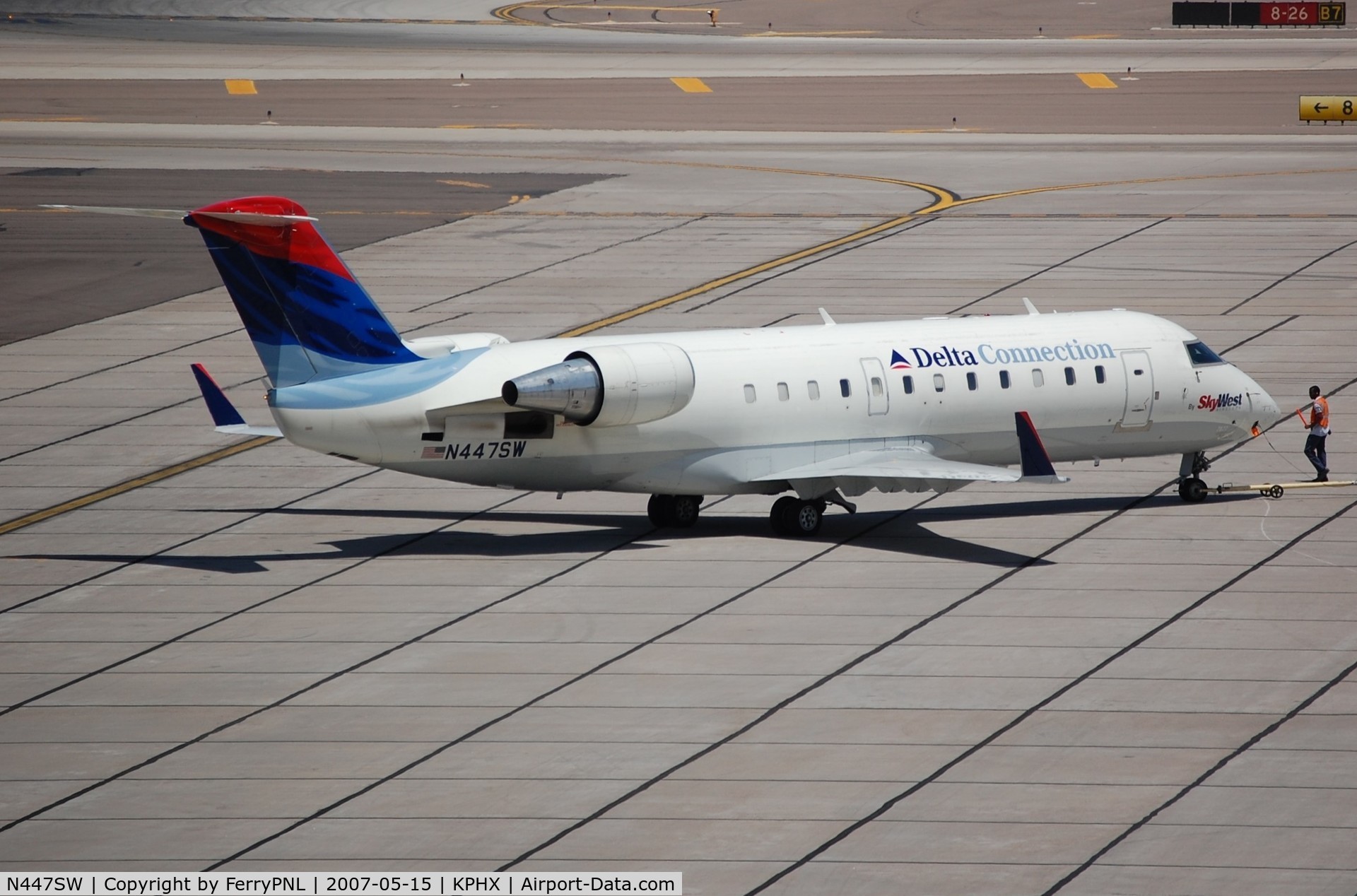 N447SW, 2002 Bombardier CRJ-200LR (CL-600-2B19) C/N 7677, Delta Connection CL200 pushed-back