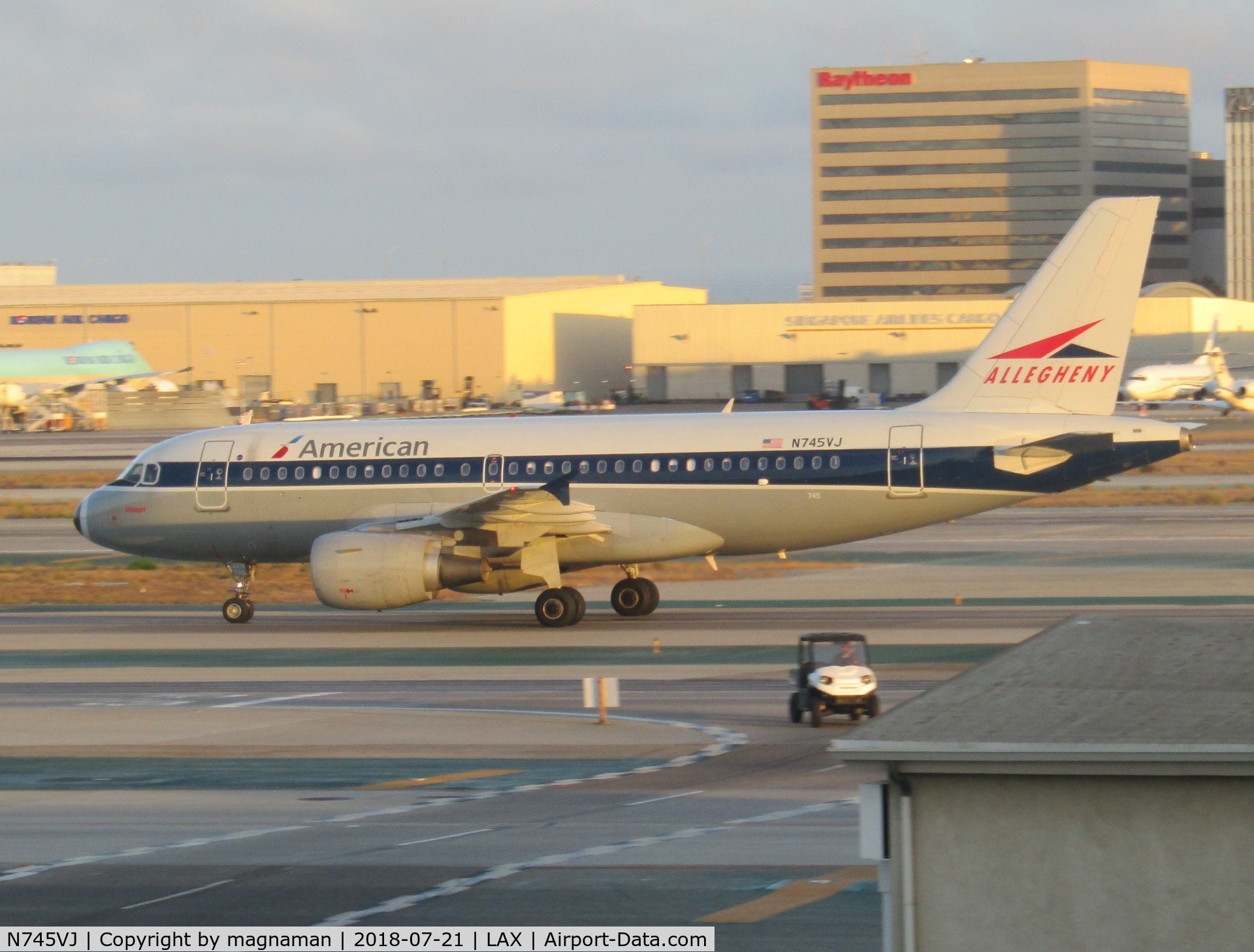 N745VJ, 2000 Airbus A319-112 C/N 1289, leaving LA at dusk - nice retro scheme