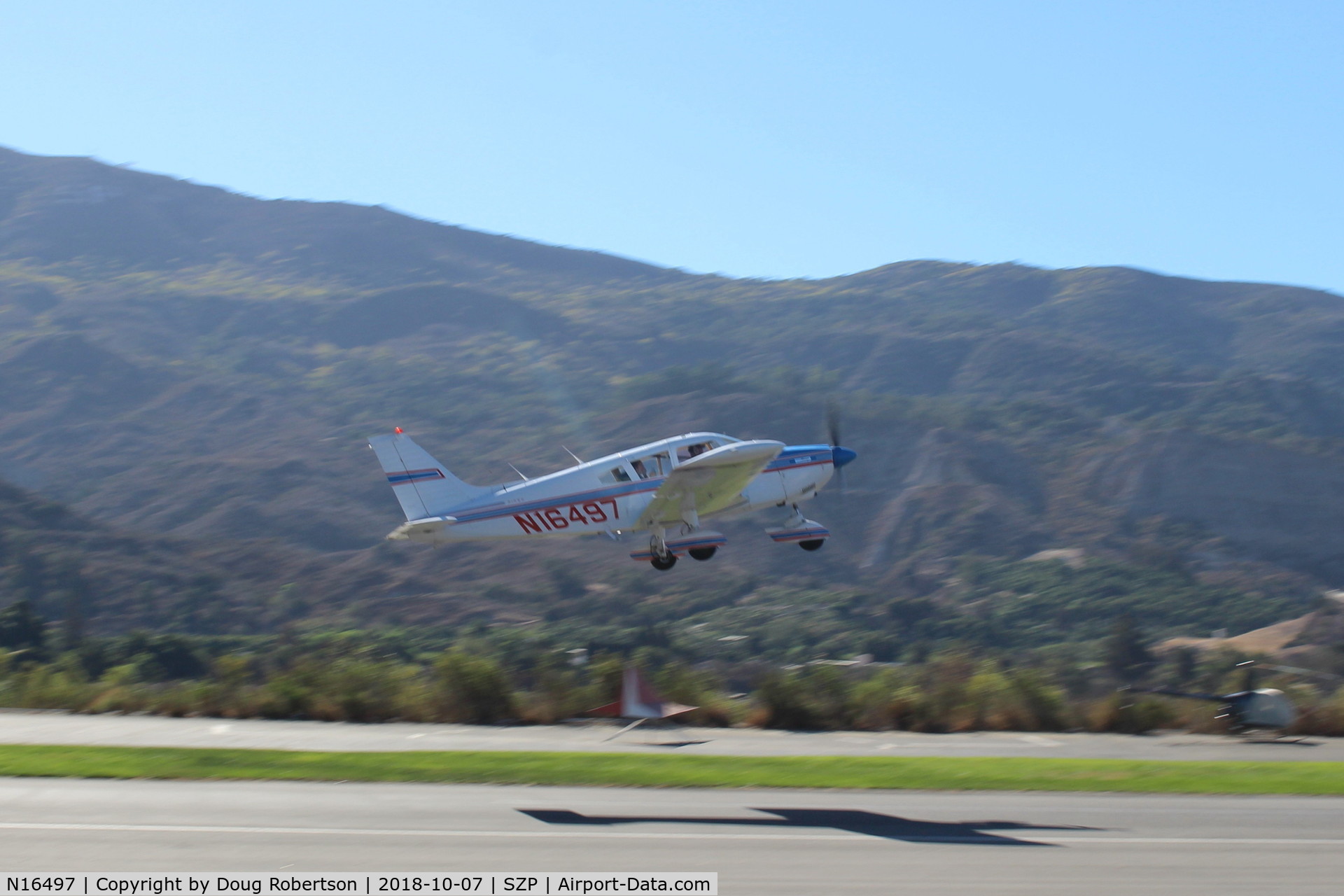 N16497, 1973 Piper PA-28-235 Cherokee Charger C/N 28-7310101, 1973 Piper PA-28-235 CHARGER, Lycoming O-540-D4B5 235 Hp, takeoff climb Rwy 22, Young Eagles Flight