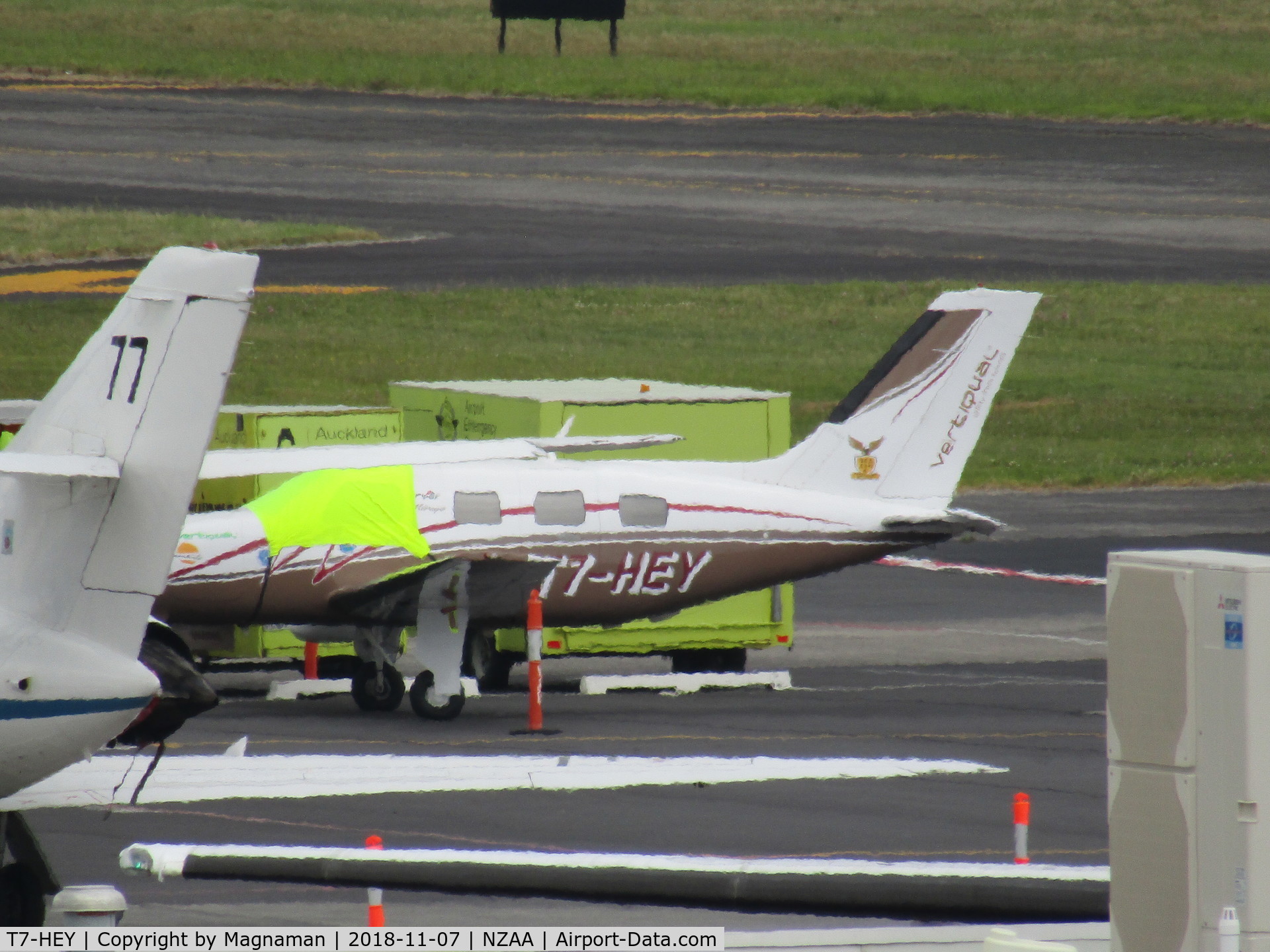 T7-HEY, Piper PA-46-350P Malibu Mirage C/N 4636499, crappy long shot from car park - on round the world flight