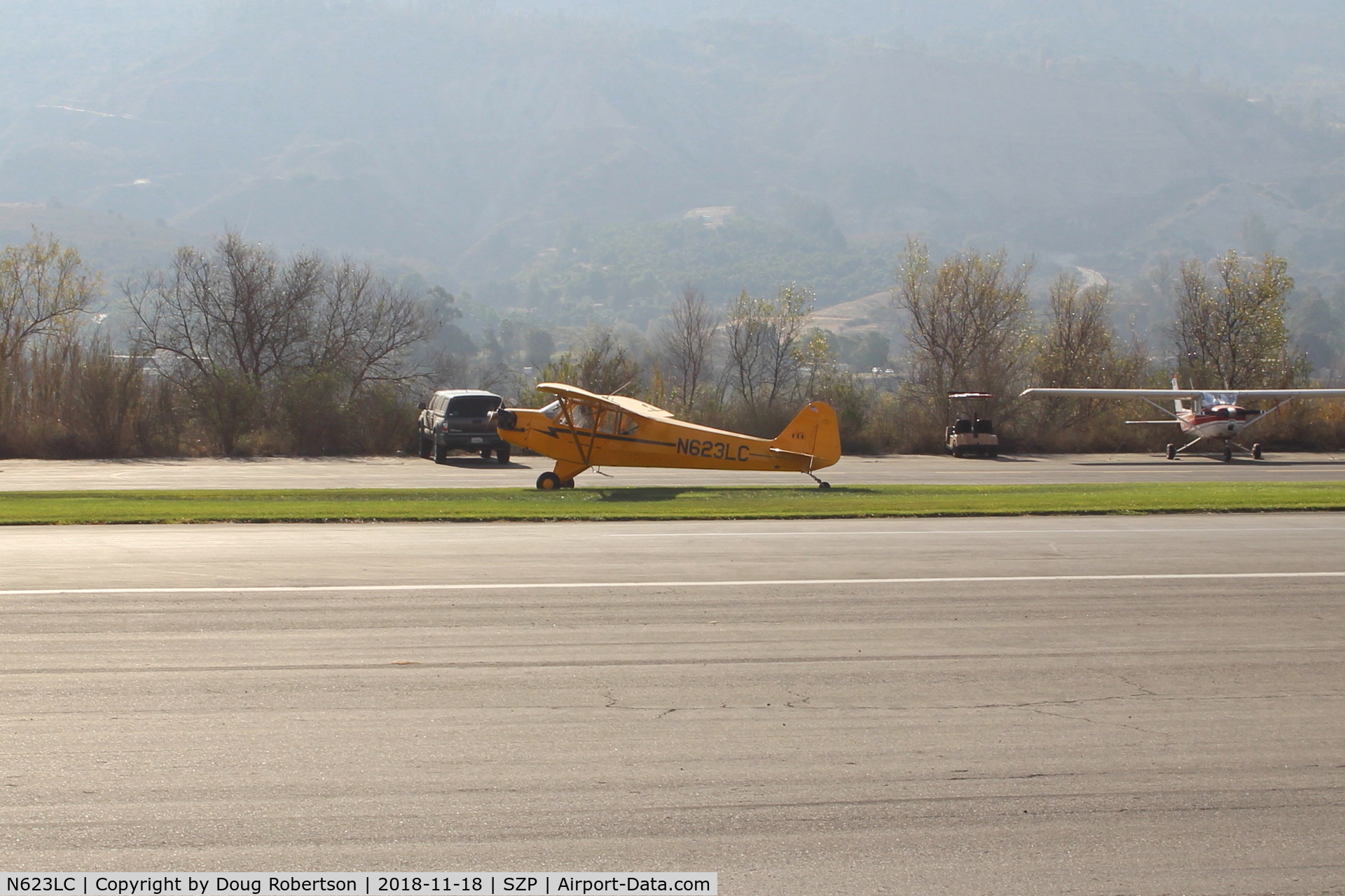 N623LC, 2006 American Legend AL3C-100 C/N AL-1024, 2006 American Legend Aircraft AL3C-100 CUB S-LSA, open cowl version, Continental O-200 100 Hp, landing roll Rwy 04R grass