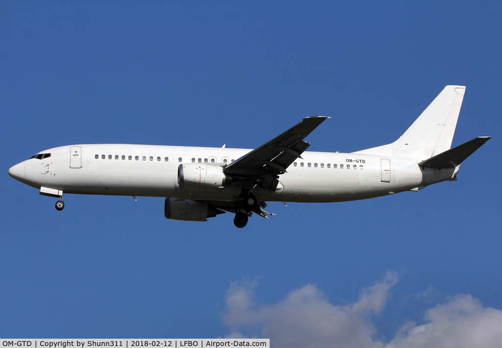 OM-GTD, 1993 Boeing 737-46J C/N 27171, Landing rwy 32L in all white c/s...