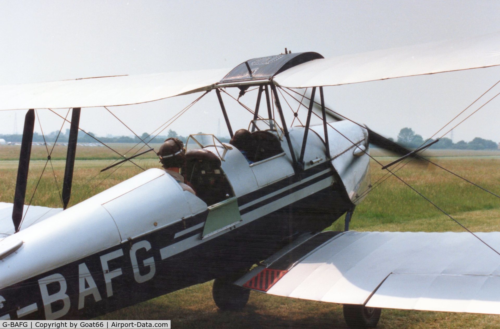 G-BAFG, 1943 De Havilland DH-82A Tiger Moth II C/N 85995, In 1980's livery, when owned and flown by father / son Jim and Peter Shaw, both Captains with British Midland