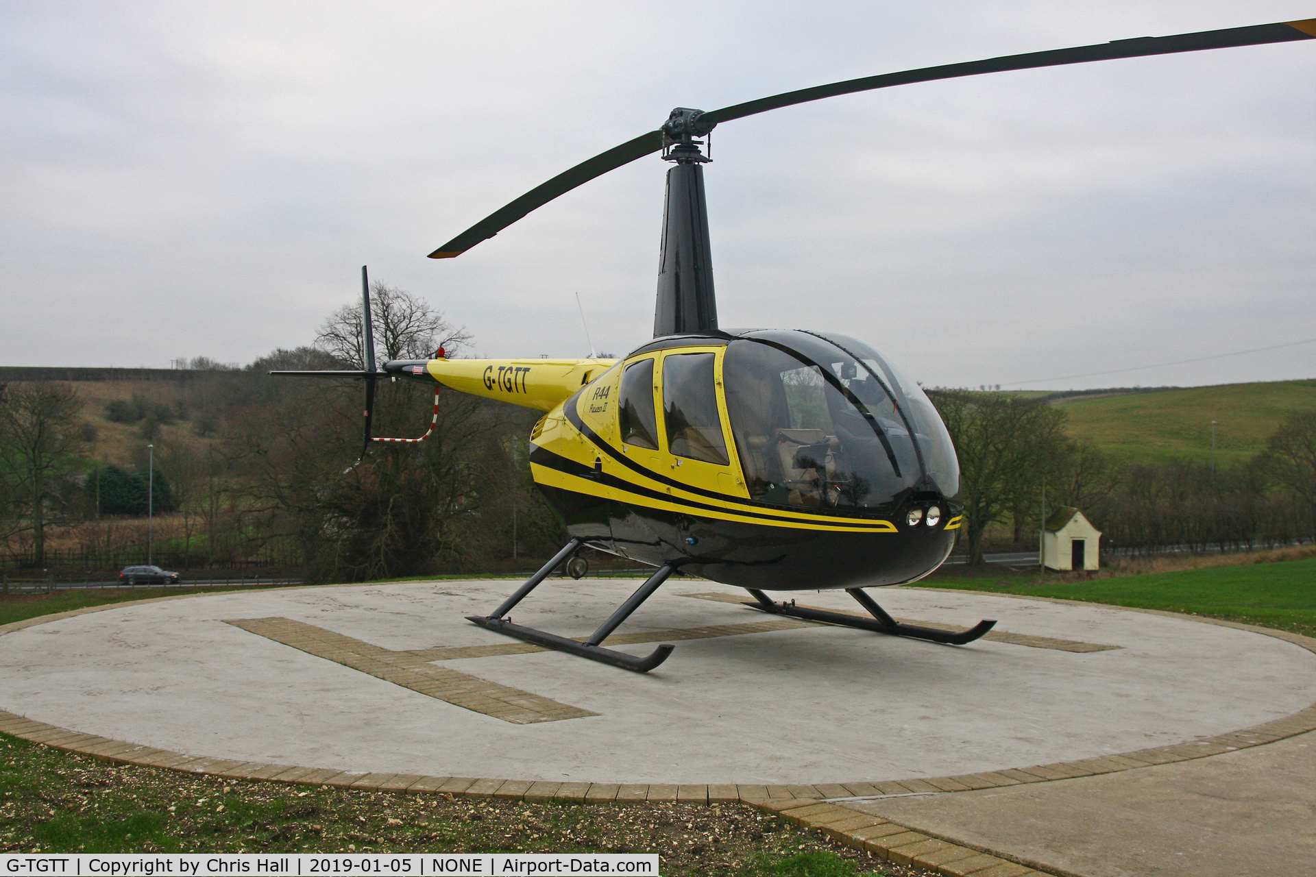 G-TGTT, 2002 Robinson R44 Raven II C/N 10023, at a private site after our flight from North Coates