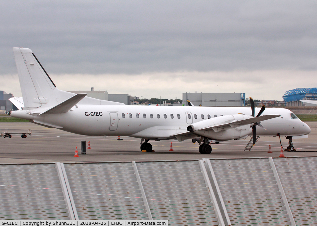 G-CIEC, 1996 Saab 2000 C/N 2000-037, Parked at the General Aviation area... all white without titles...