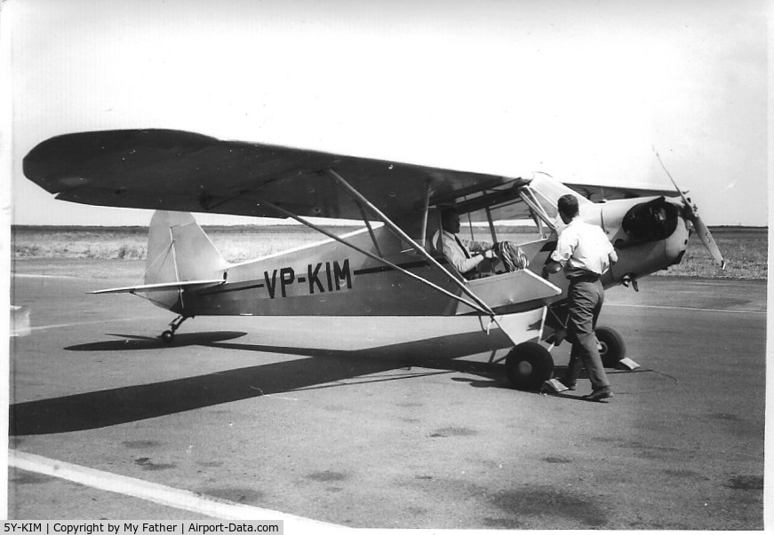 5Y-KIM, 1948 Piper J3C-65 Cub Cub C/N 18658-650, An old scanned print of mine taken at Wilson Airport, Kenya