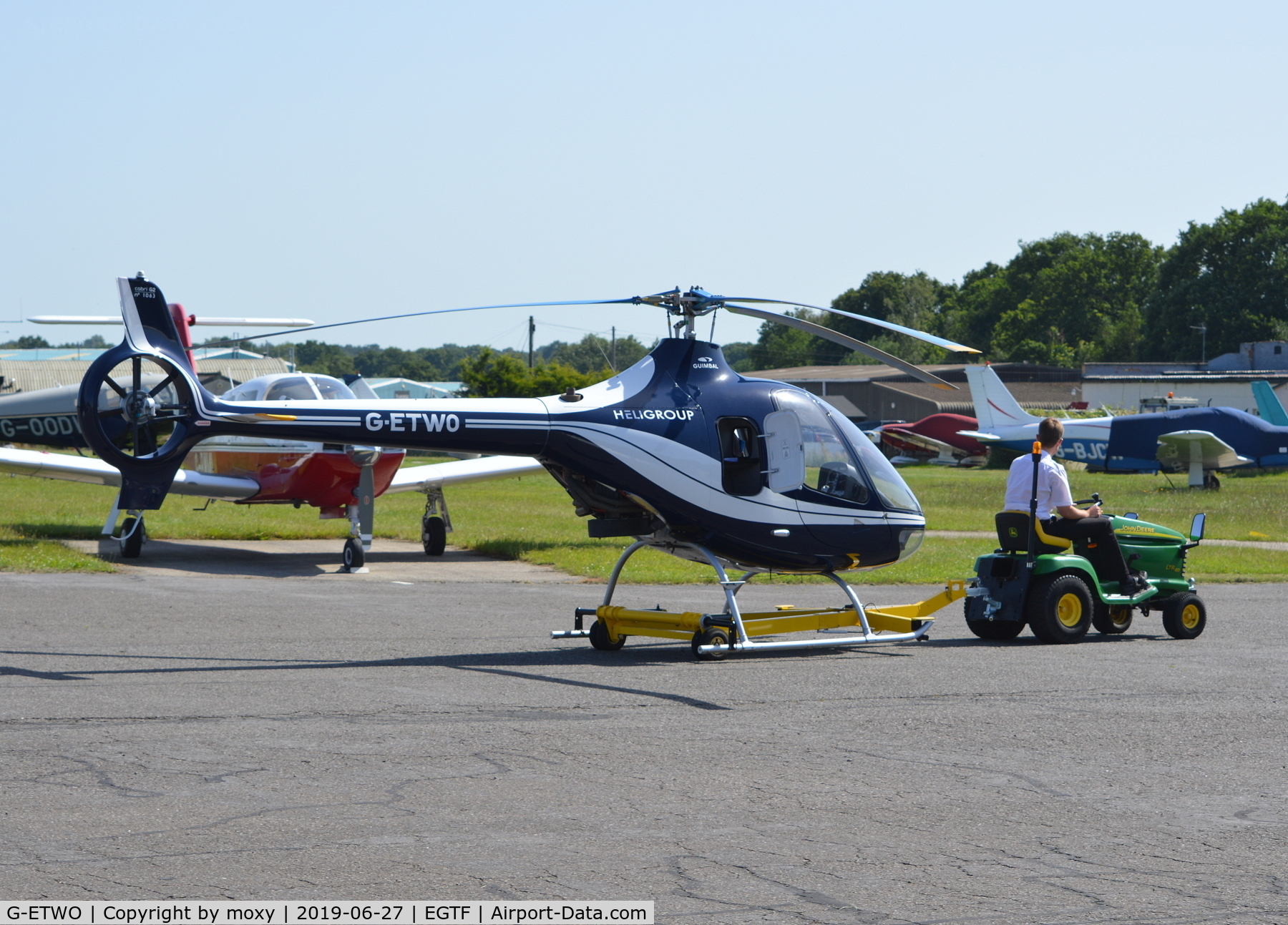 G-ETWO, 2014 Guimbal Cabri G2 C/N 1063, Guimbal Cabri G2 being towed to the hangar at Fairoaks.