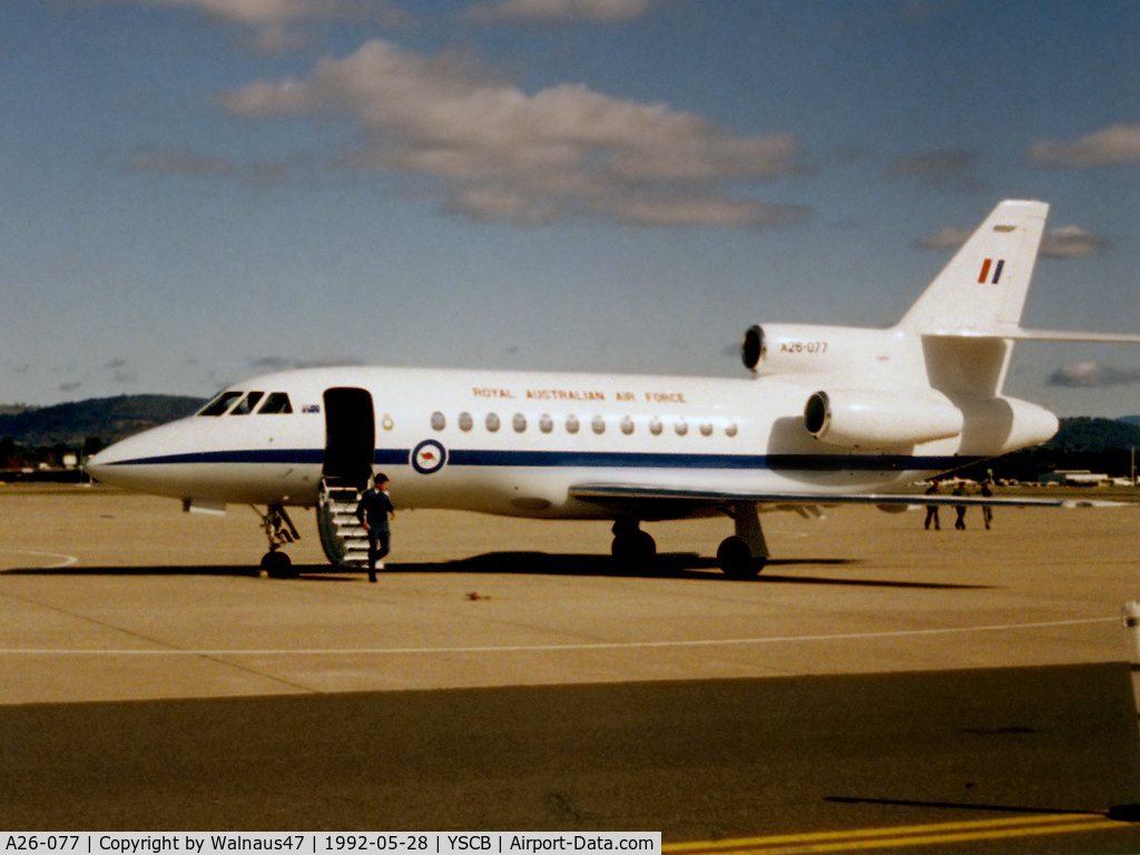 A26-077, 1989 Dassault Falcon 900B C/N 077, Low res RAAF 34 Squadron Falcon 900 A26-077 Cn 077 on the apron at RAAF Base Fairbairn YSCB on 28May1992. The aircraft had just returned from a round trip to Sydney. Flight time was 0.4 hours. The F900 delivered a Flight Crew to  Hawker Pacific Sydney.