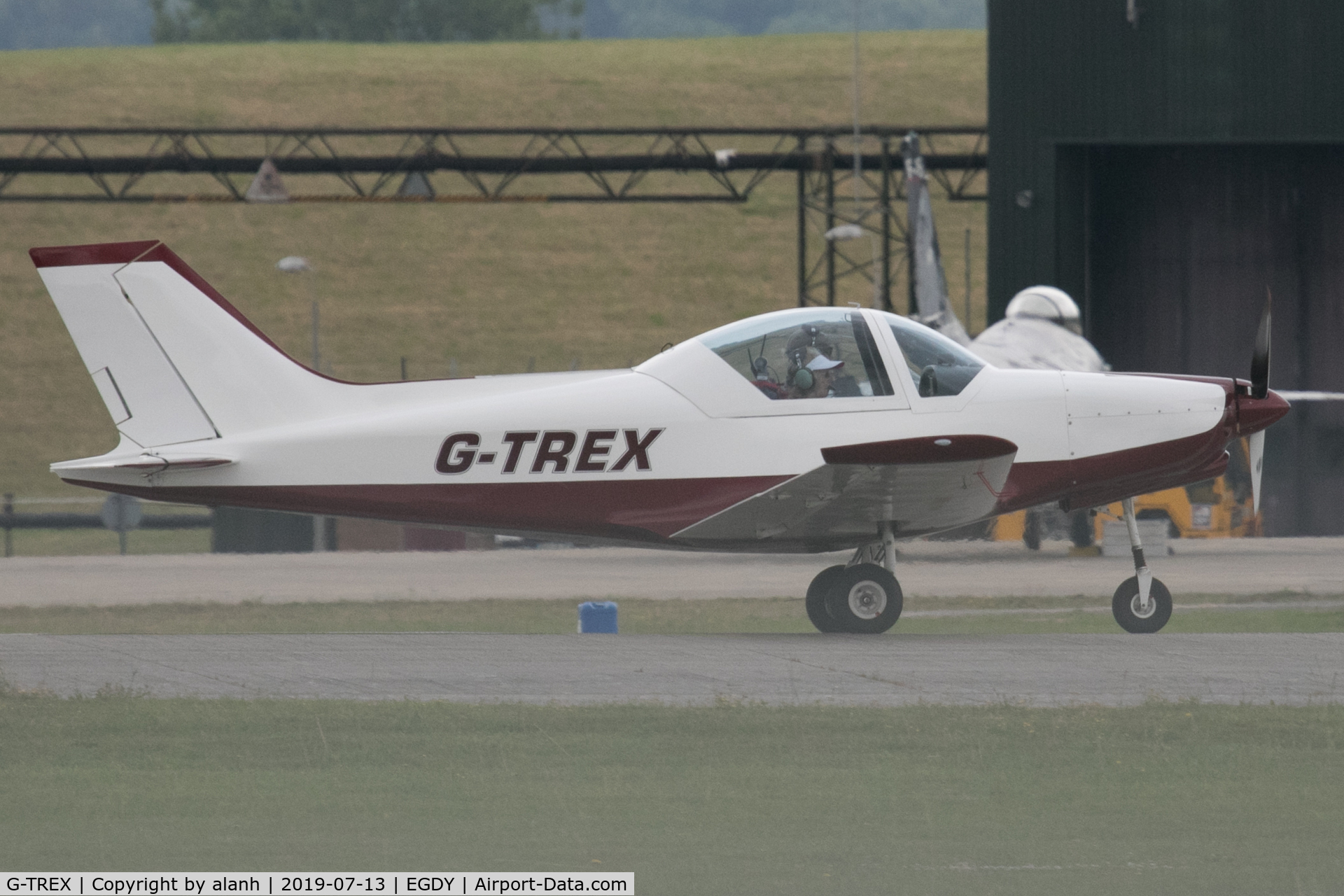 G-TREX, 2006 Alpi Aviation Pioneer 300 C/N PFA 330-14305, Rolling past the parked Belgian F-16, after arrival as a visitor at the 2019 Yeovilton Air Day