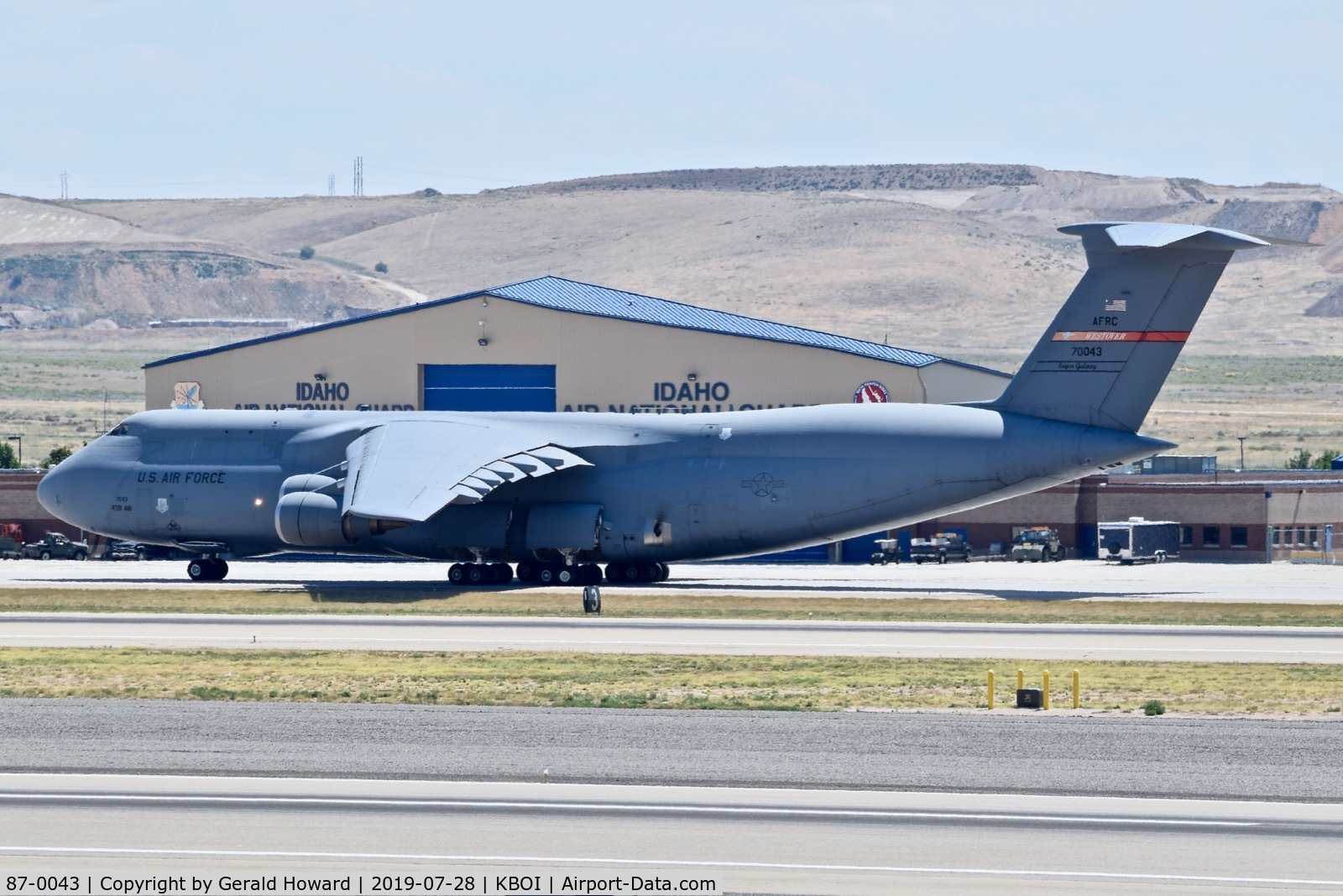 87-0043, 1988 Lockheed C-5M Super Galaxy C/N 500-129, Taxiing on Bravo. 439th Airlift Wing 