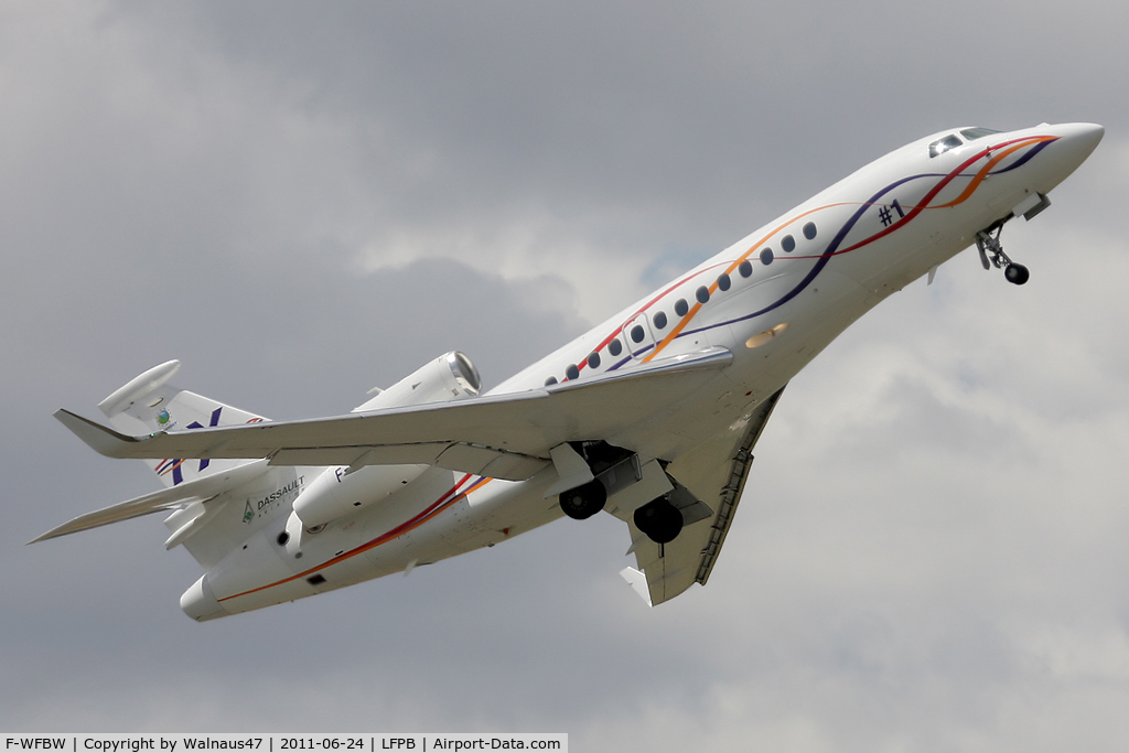 F-WFBW, 2005 Dassault Falcon 7X C/N 001, First Built Dassault Falcon 7X F-WFBW airborne from LBG/LFPB on Friday 24Jun2011. The BizJet is retracting the main wheels, after take-off. Photo taken at the 49th Salon International - Paris Air Show at Le Bourget. This is Falcon 7X Construction Number 1