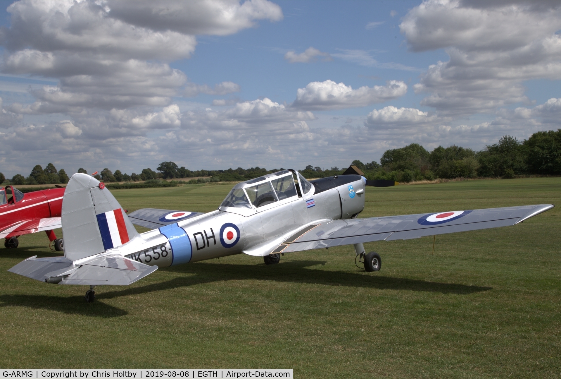 G-ARMG, 1952 De Havilland DHC-1 Chipmunk T.10 C/N C1/0575, Parked on show in its restored Cranwell College livery at the 'Gathering of Moths' Day 2019 at Old Warden