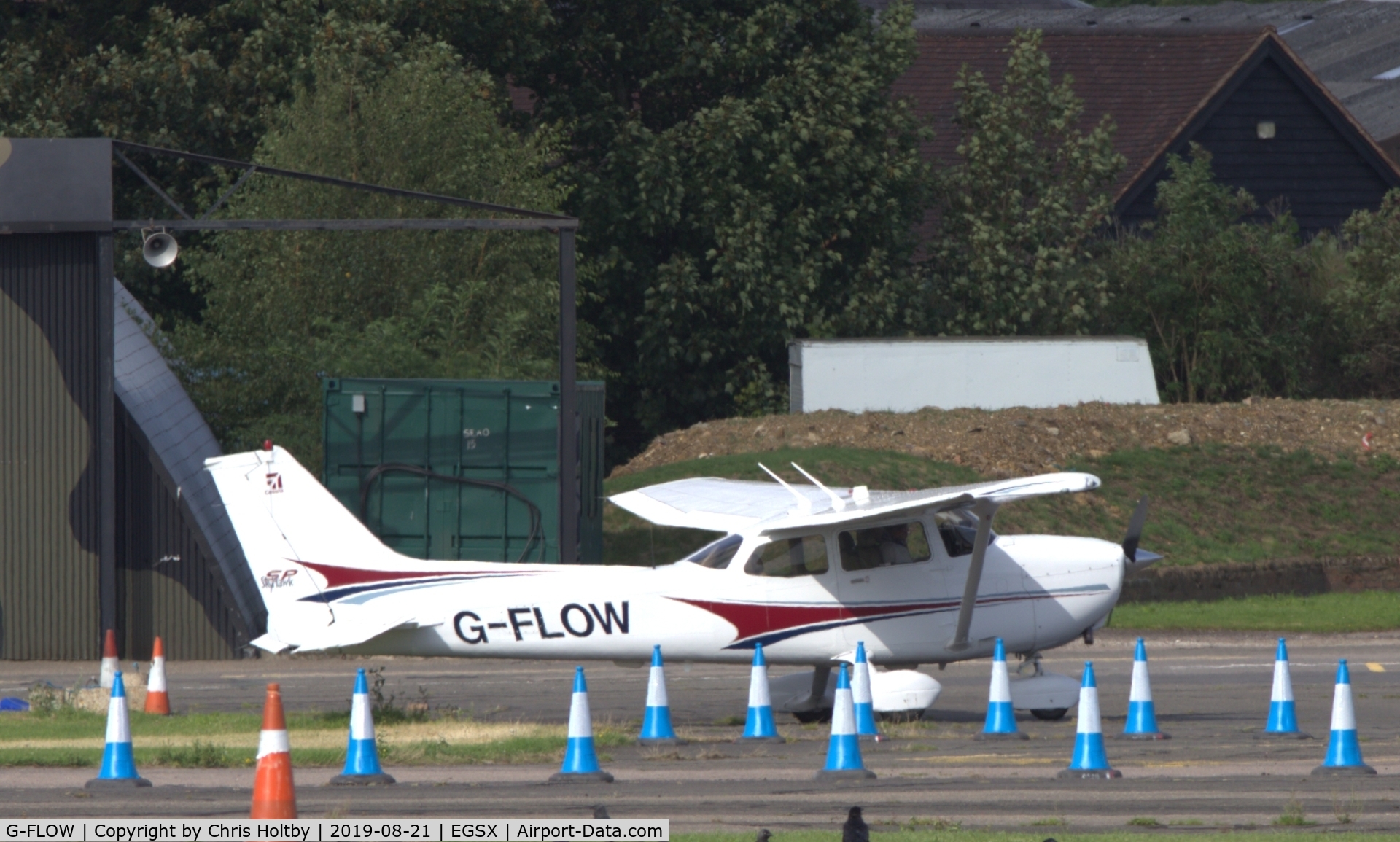 G-FLOW, 2004 Cessna 172S C/N 172S9677, Parked at North Weald undergoing pre-flight checks
