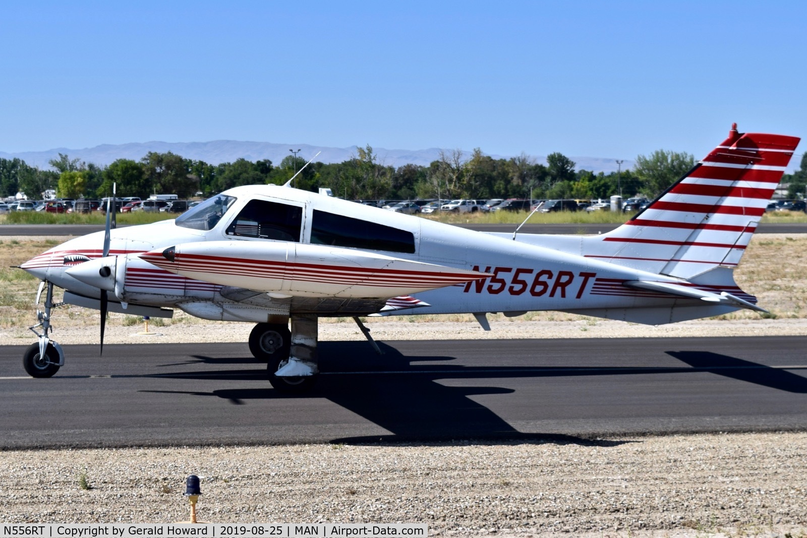 N556RT, 1969 Cessna 310P C/N 310P0077, Taxiing on Alpha.