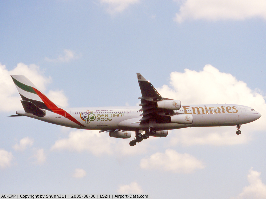 A6-ERP, 1997 Airbus A340-313 C/N 185, Landing rwy 32 with additional 'Fifa World Cup Germany 2006' titles
