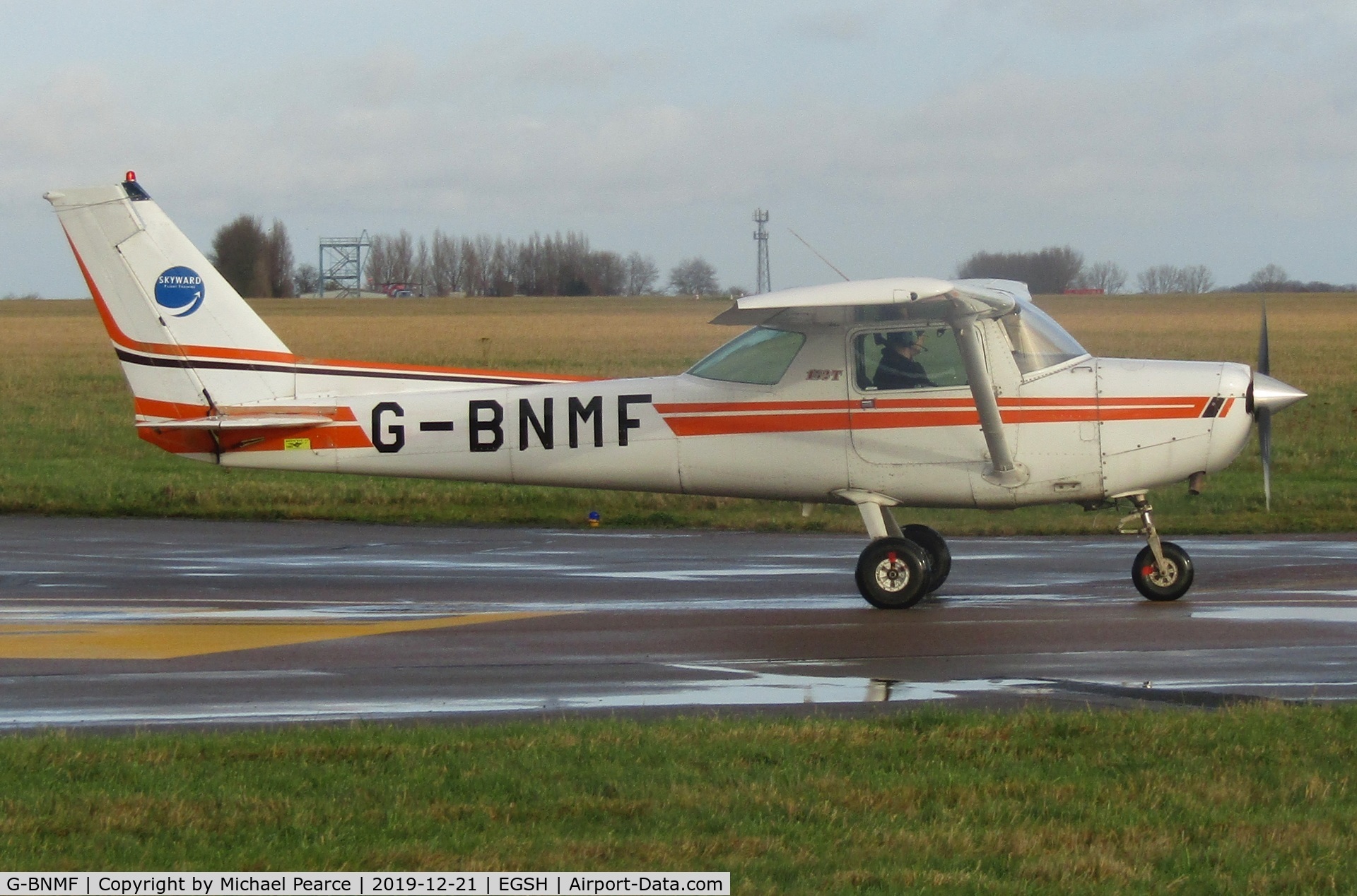G-BNMF, 1982 Cessna 152 C/N 152-85563, Departing SaxonAir for Duxford (QFO).