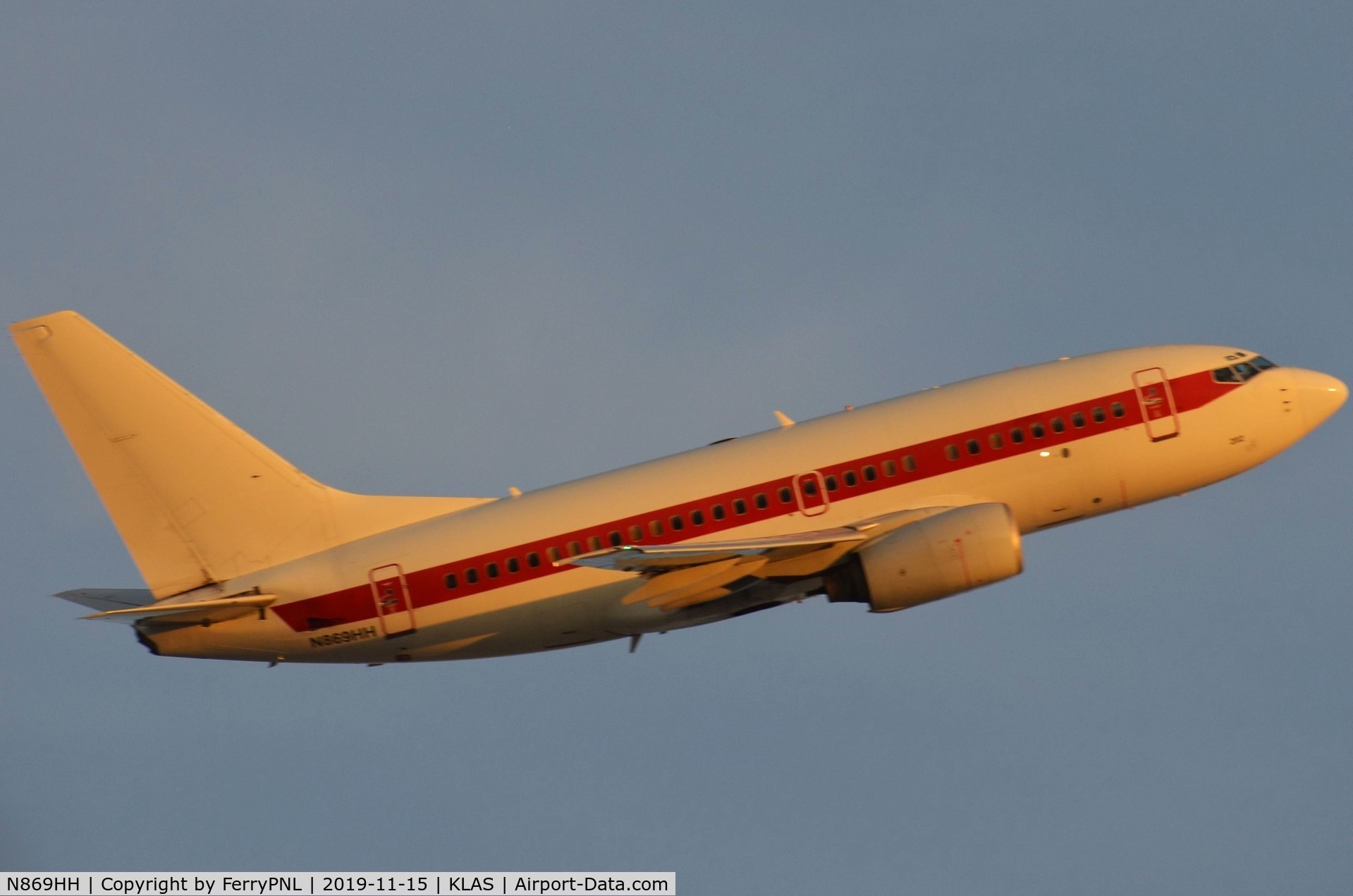 N869HH, 2001 Boeing 737-66N C/N 28650, EG&G (Janet) B736 departing at sunset