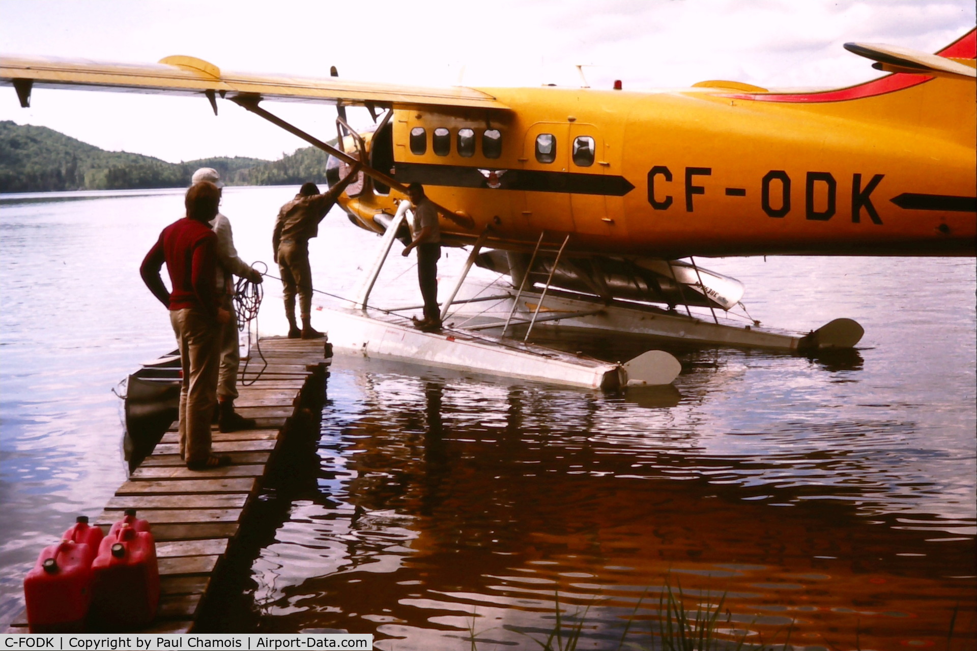 C-FODK, 1953 De Havilland Canada DHC-3 Otter C/N 13, At Sandspit Lake, northern Ontario in 1975, re-supplying an Ontario Geological Survey field crew.