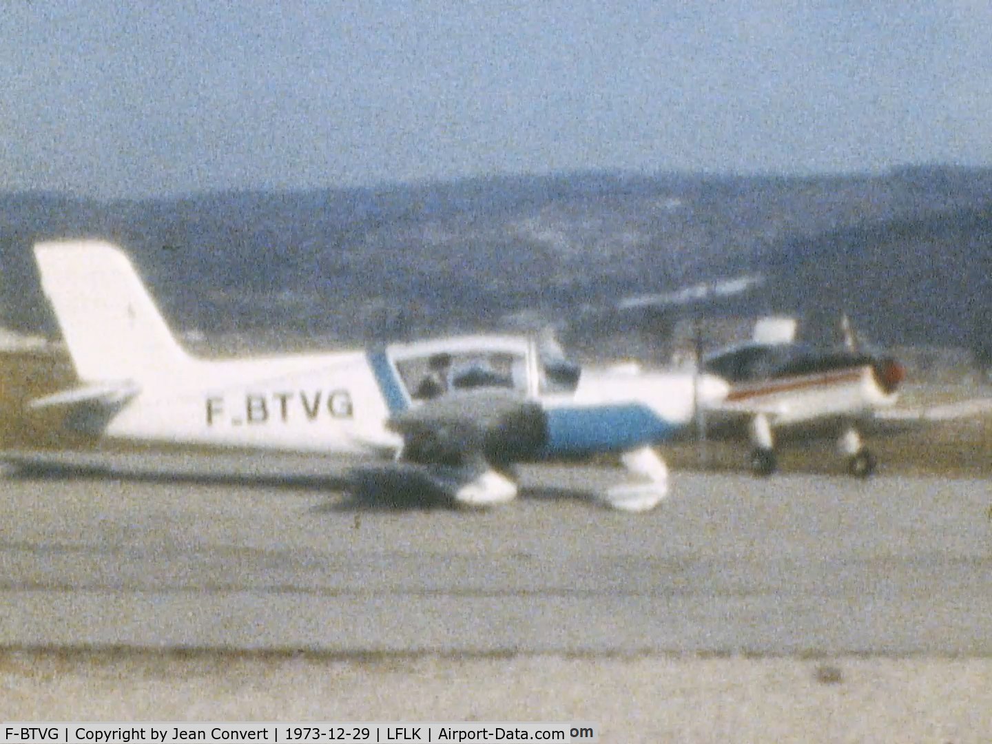 F-BTVG, Socata MS-893E Rallye 180GT C/N 12124, Private aircraft hangared at Oyonnax, France, at this time. Photo extracted from Super-8 mm movie done by my father.