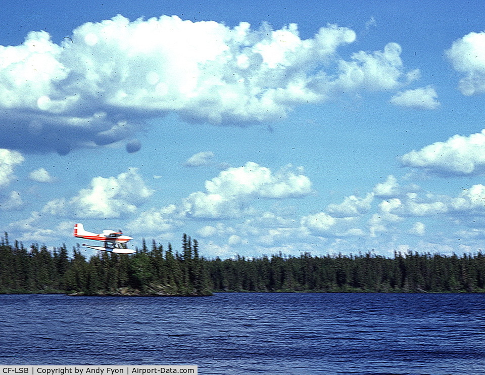 CF-LSB, 1959 Cessna 180B C/N 50580, CF-LSB delivering food to a geologists' mineral exploration camp, McVickar Lake, northwestern Ontario, July 1975. Likely flew out of Pickle Lake water base, but I am uncertain.