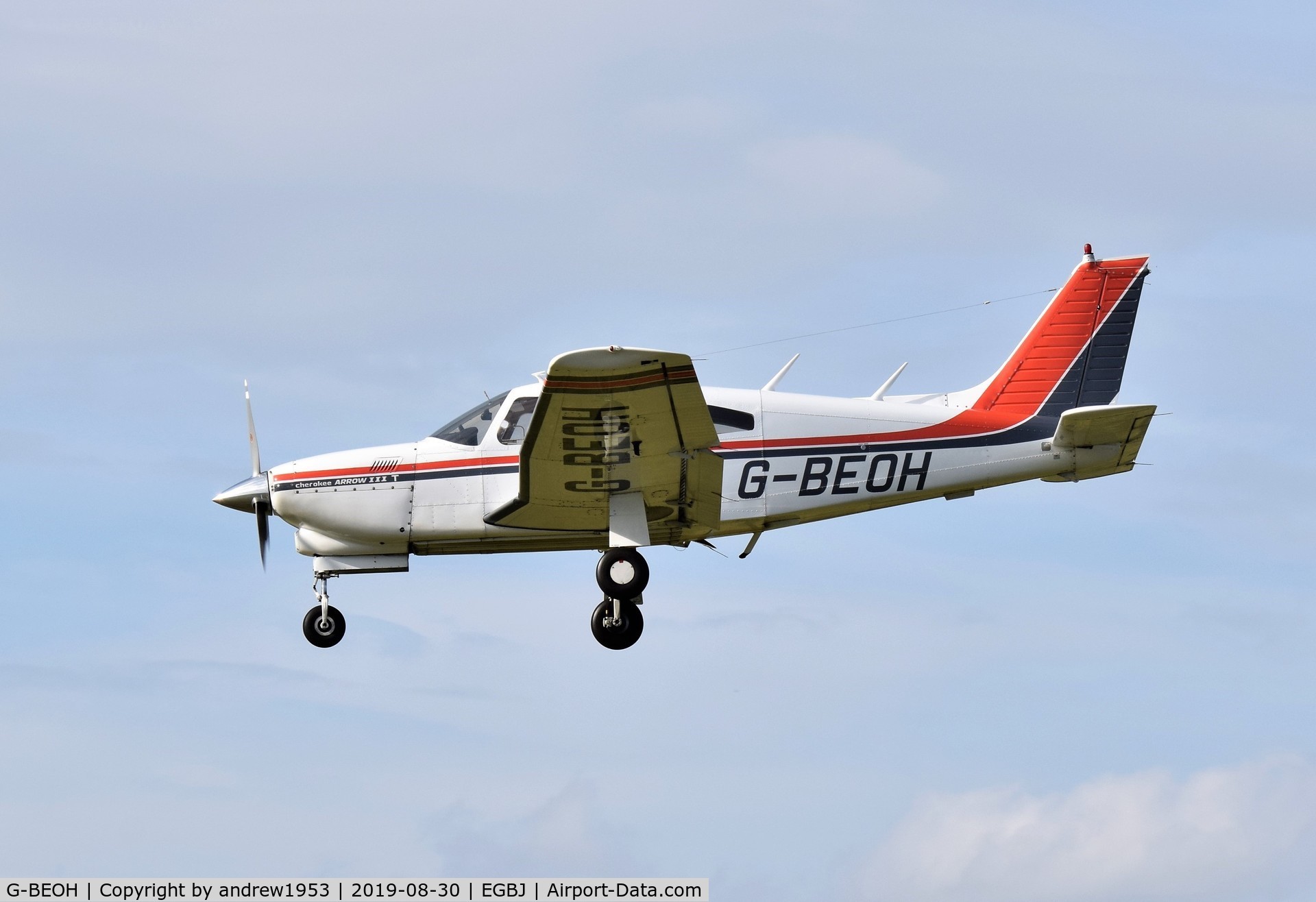 G-BEOH, 1977 Piper PA-28R-201T Cherokee Arrow III C/N 28R-7703038, G-BEOH landing at Gloucestershire Airport.