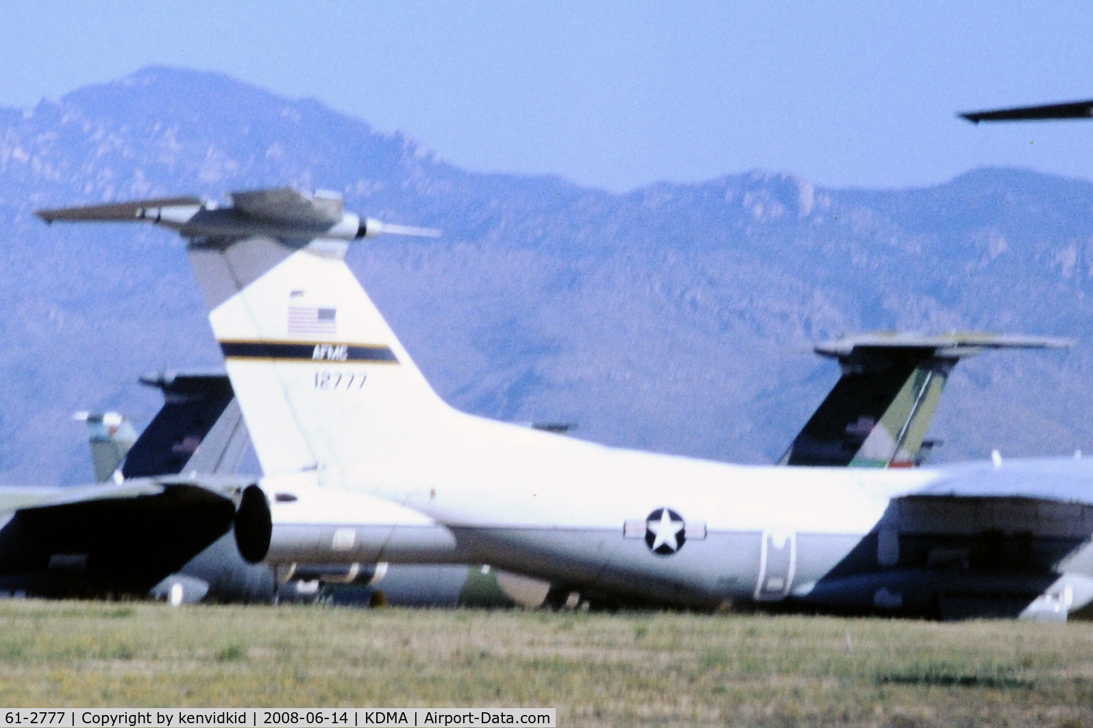 61-2777, 1961 Lockheed NC-141A-5-LM Starlifter C/N 300-6003, At Davis Monthan from an air-conditioned bus, circa 1996.