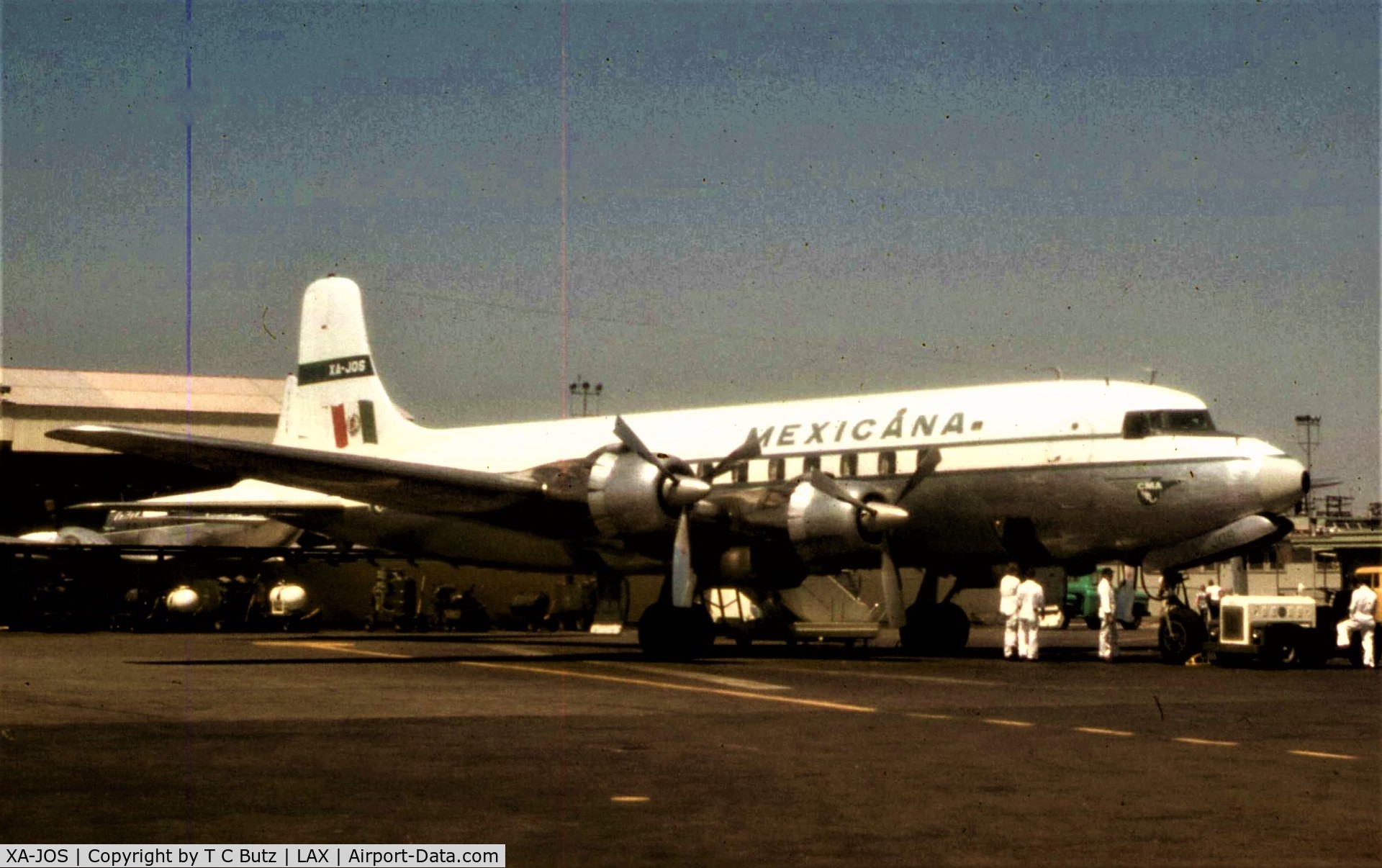 XA-JOS, Douglas DC-6 C/N 43212, While working for PanAm we also serviced CMA/Mexican at LAX. They were always interesting to deal with.
This is shot from Taxiway while driving PanAm jeep.