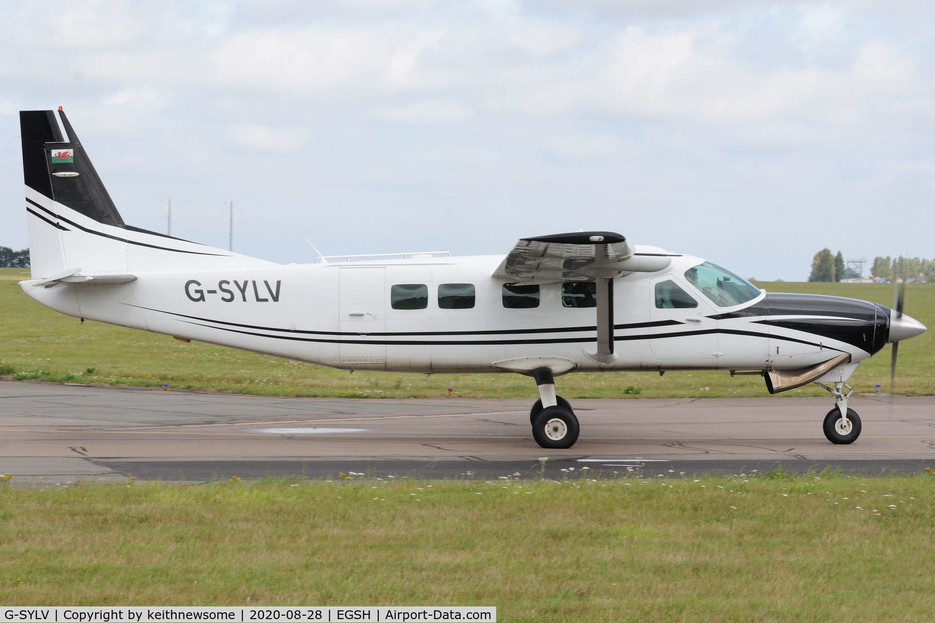 G-SYLV, 2002 Cessna 208B  Grand Caravan C/N 208B0936, Leaving Norwich.