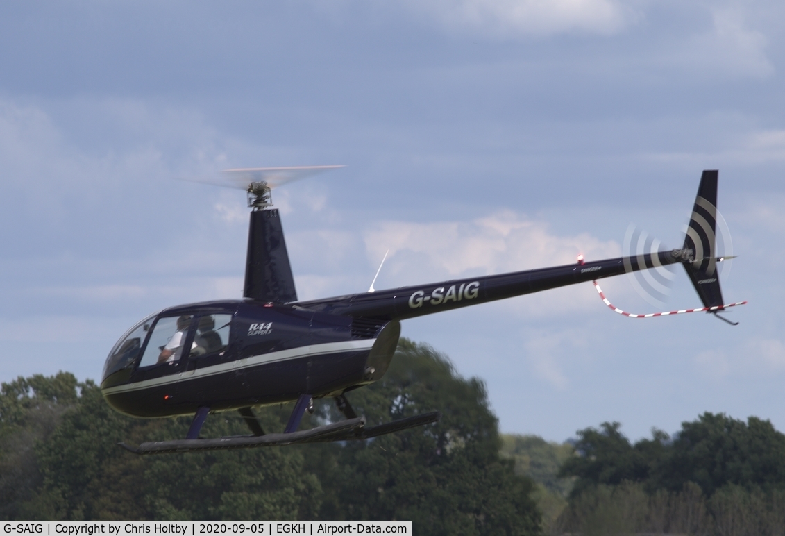 G-SAIG, 2006 Robinson R44 II C/N 11364, Lifting off from Headcorn for another pleasure flight