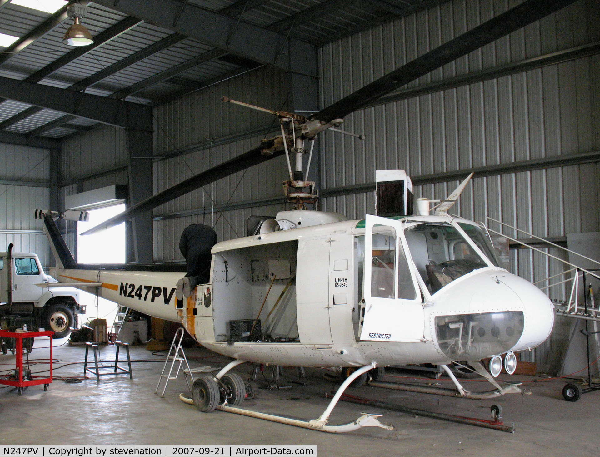 N247PV, 1965 Bell UH-1D Iroquois C/N 4693, Pacific Valley Aviation 1965 Bell UH-1D @ Arbuckle, CA Lone Star Road home base (ex 65-9649) - now in PVA colors
