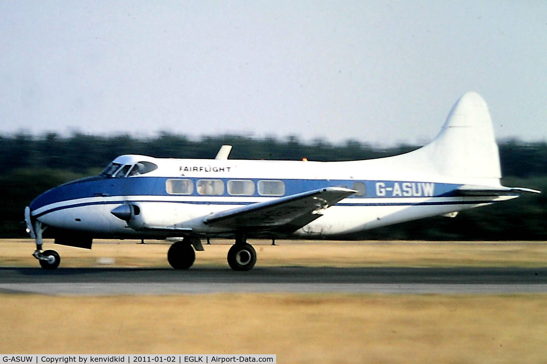 G-ASUW, 1949 De Havilland DH-104 Dove 1A C/N 04256, Riley conversion departing Blackbushe 1976.