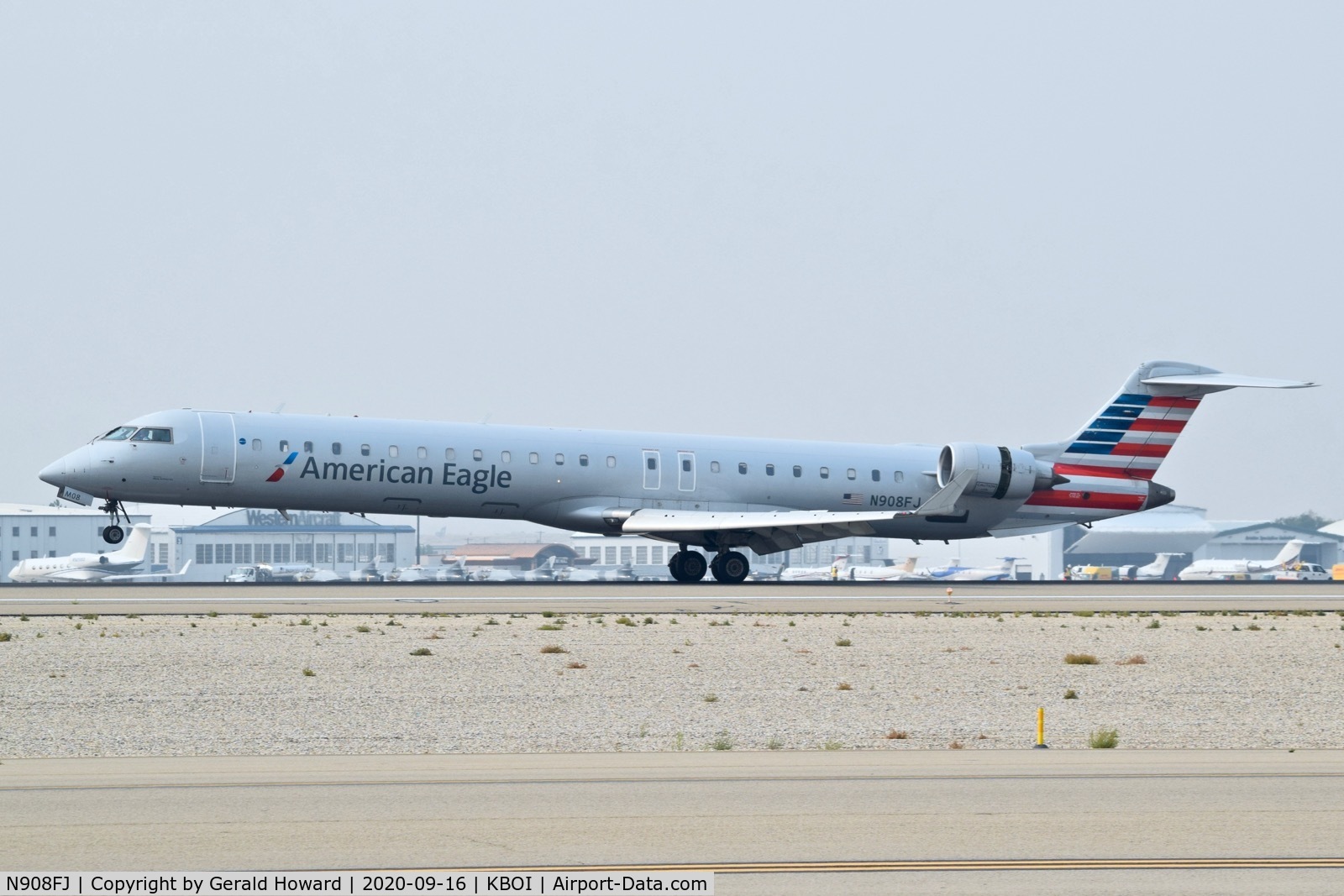 N908FJ, 2003 Bombardier CRJ-900ER (CL-600-2D24) C/N 15008, Landing 10L.
