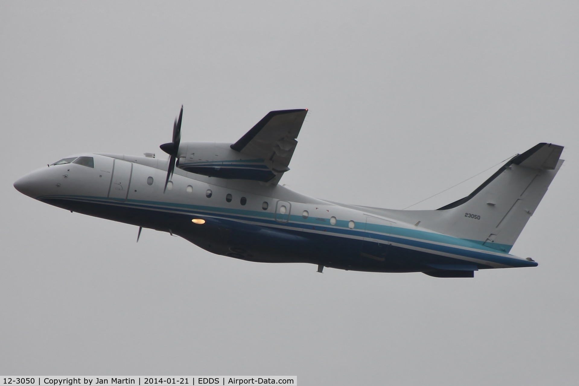 12-3050, 1995 Dornier 328-100 C/N 3050, Take off on cloudy winterday.