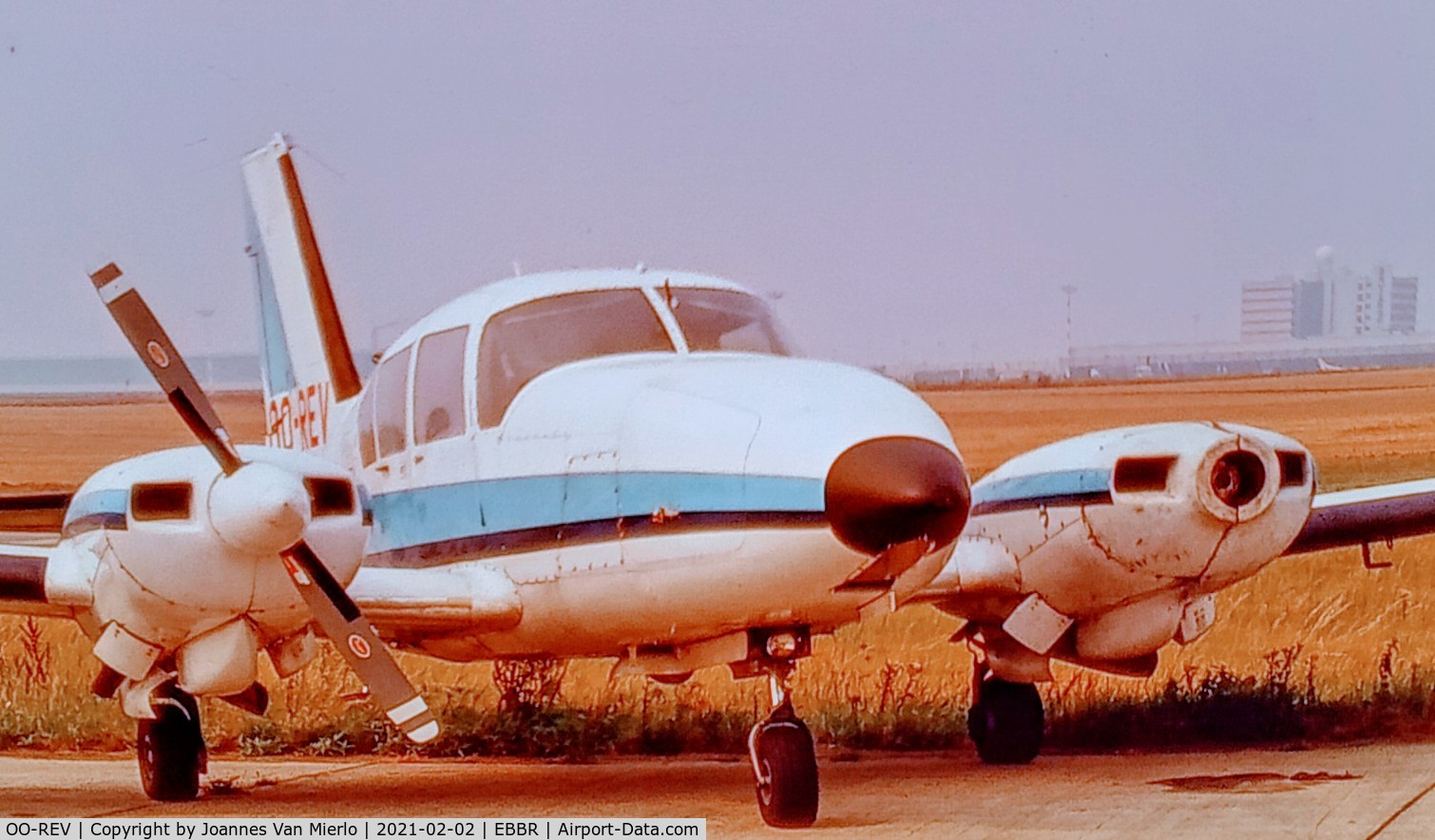 OO-REV, 1975 Piper PA-23-250 Turbo Aztec E C/N 27-7554022, Scan from slide