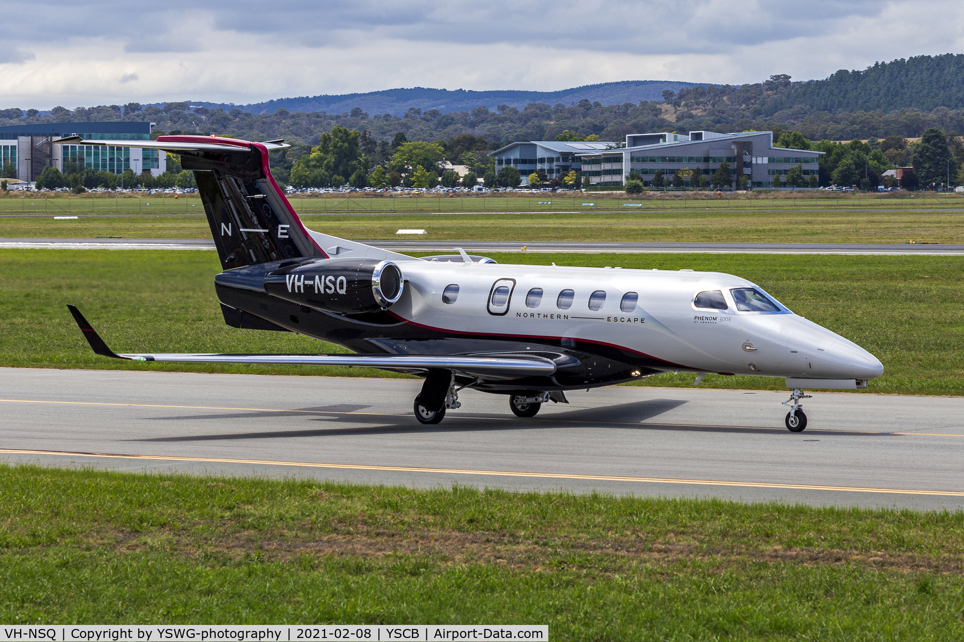 VH-NSQ, 2018 Embraer EMB-505 Phenom 300 C/N 50500453, Northern Escape (VH-NSQ) Embraer Phenom 300E taxiing at Canberra Airport.