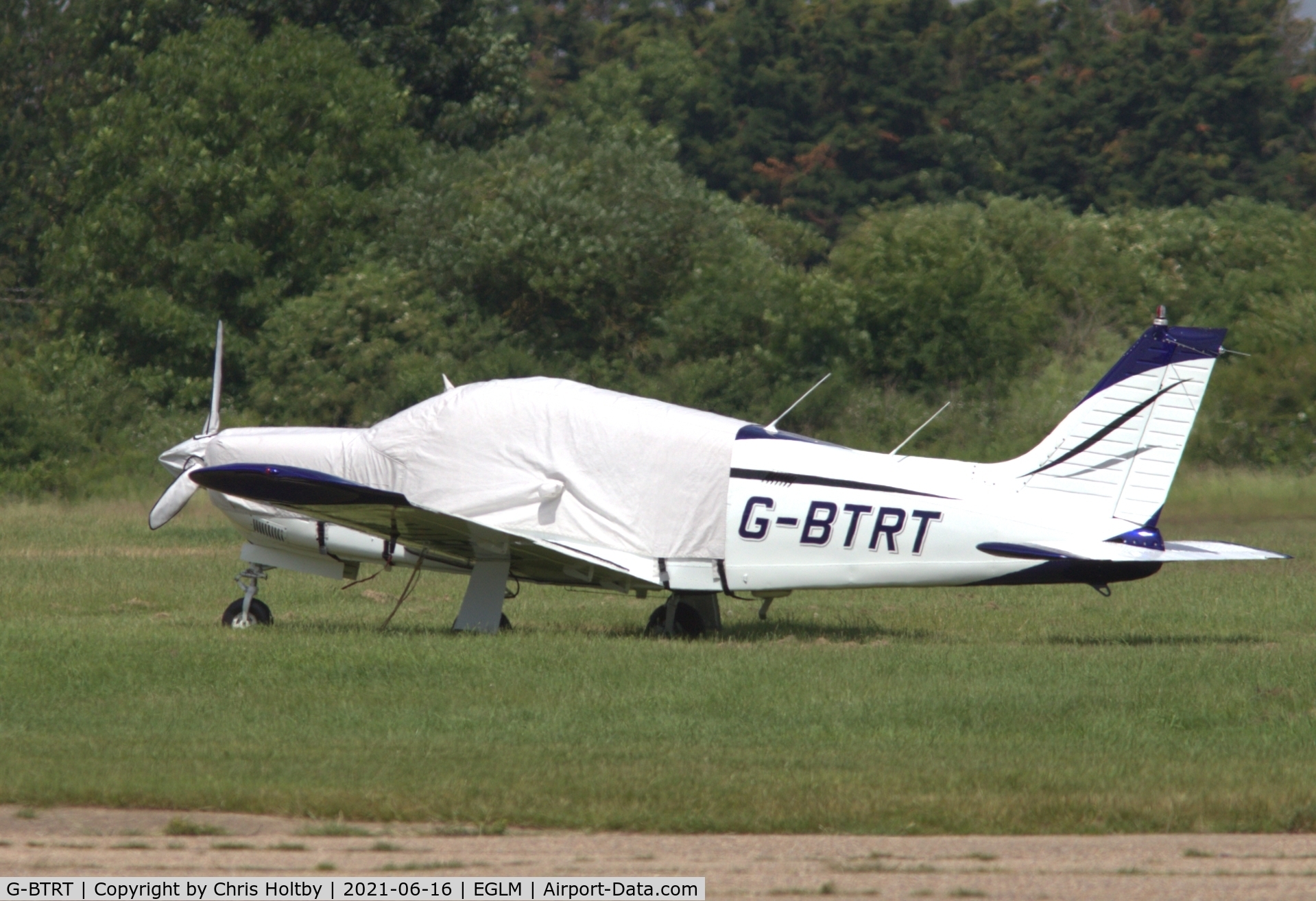 G-BTRT, 1975 Piper PA-28R-200 Cherokee Arrow C/N 28R-7535270, Parked at White Waltham in navy and white livery