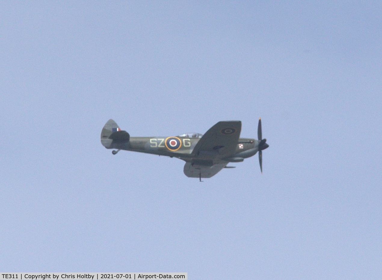 TE311, 1945 Supermarine 361 Spitfire LF.XVIe C/N CBAF.IX.4497, Flying past Amwell, Hertfordshire in company with AB910
