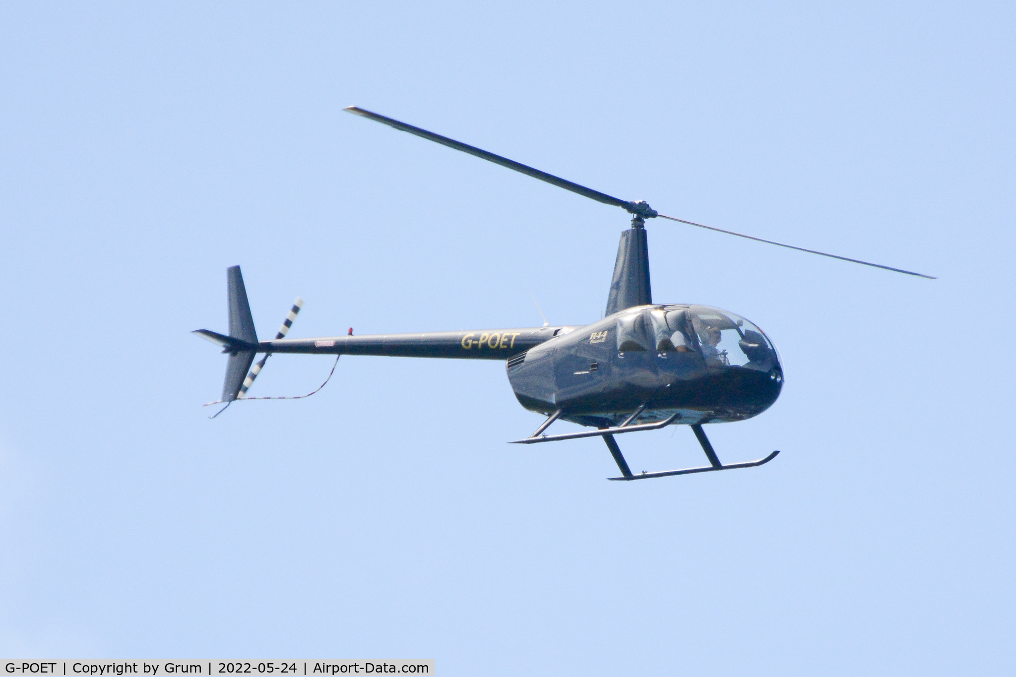 G-POET, 2003 Robinson R44 Raven II C/N 10219, Over Anglesey, North Wales