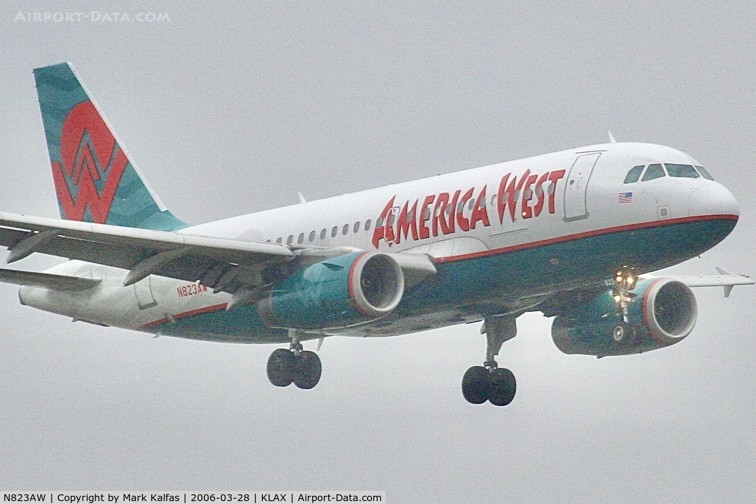 N823AW, 2001 Airbus A319-132 C/N 1463, America West Airbus A319-132, N823AW on a stormy approach 7R LAX.