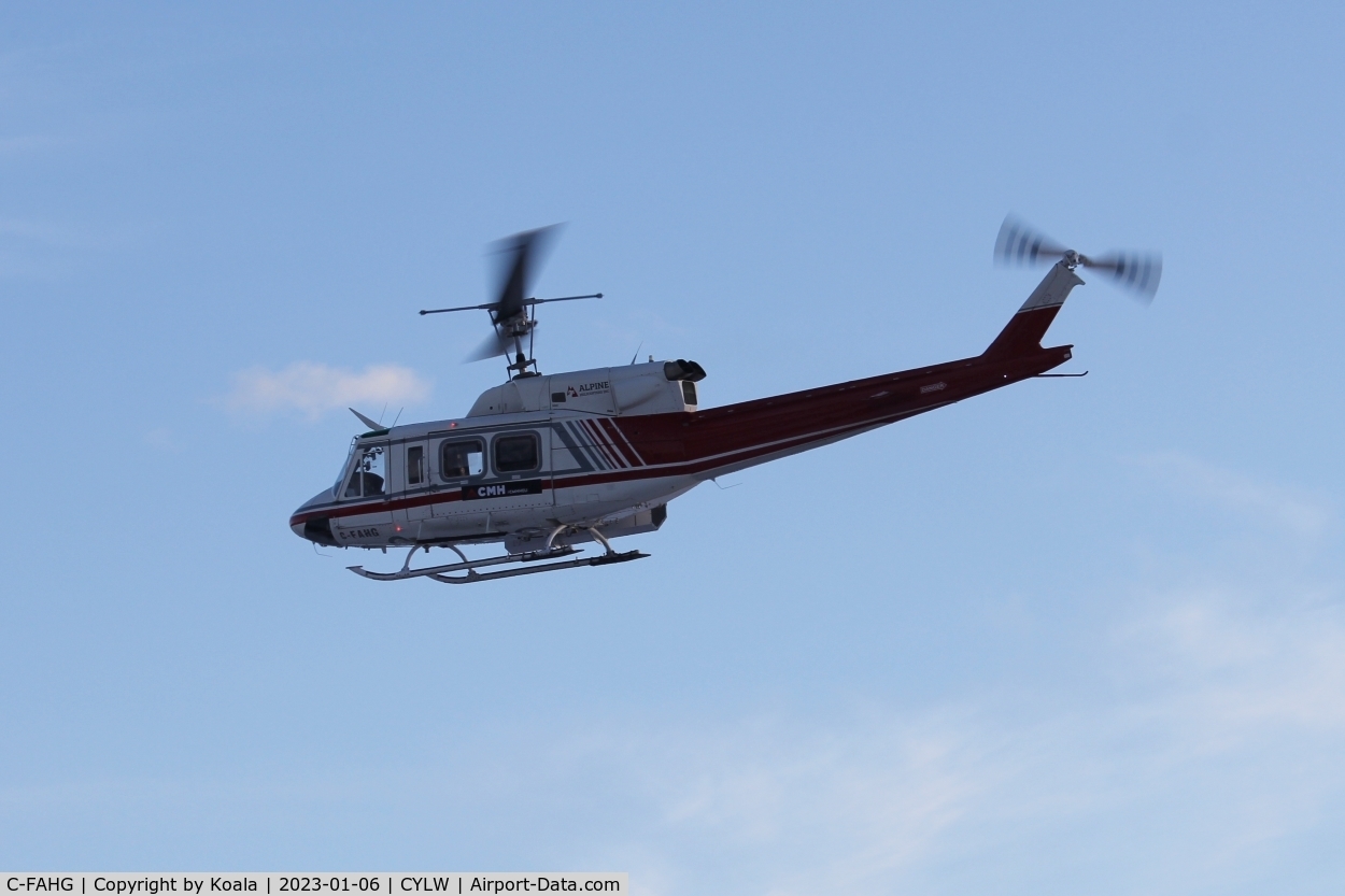 C-FAHG, Bell 212 C/N 30940, Flying around the airport.