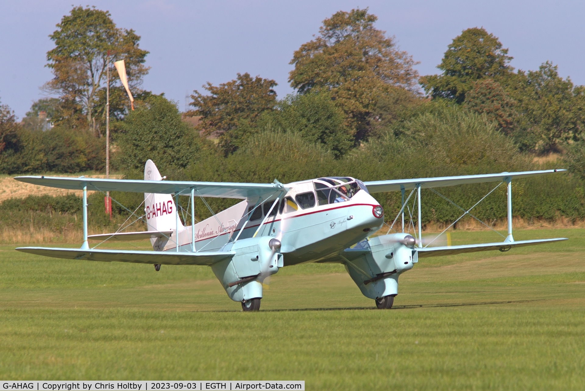 G-AHAG, 1945 De Havilland DH-89A Dominie I/Dragon Rapide C/N 6926, Taking off for another pleasure flight at Old Warden