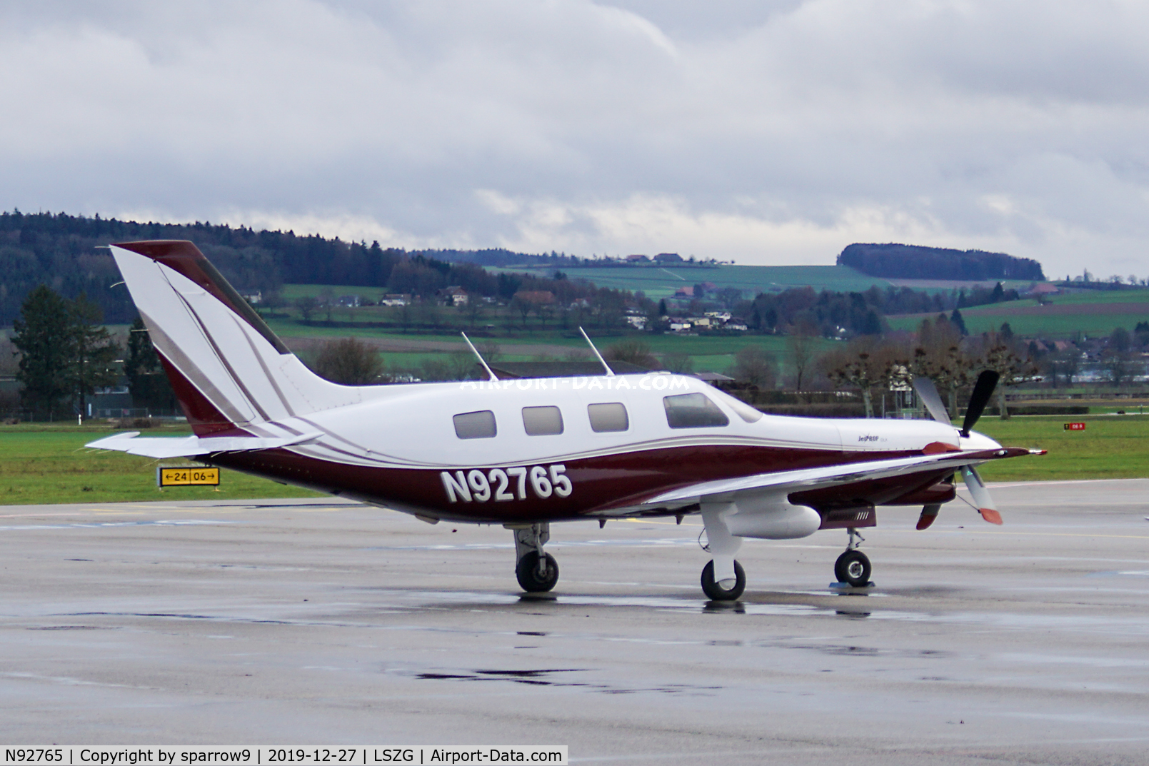 N92765, 1996 Piper PA-46-350P Malibu Mirage C/N 4636070, On a wet winter-day at Grenchen.