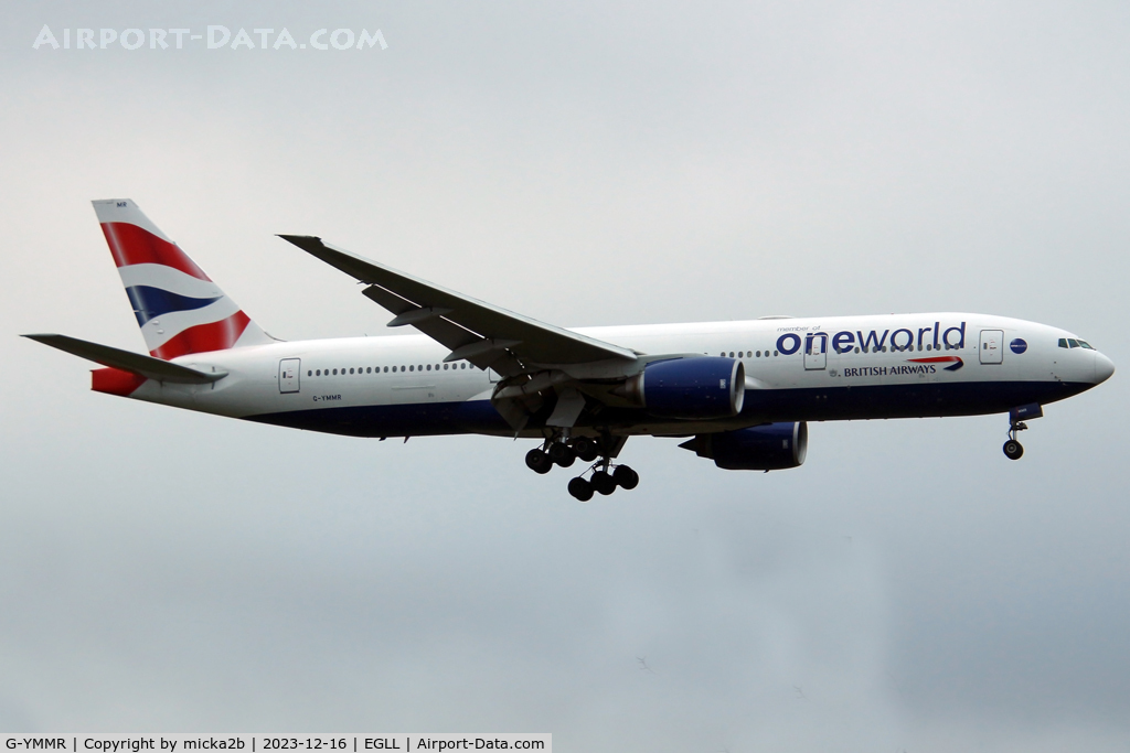 G-YMMR, 2008 Boeing 777-236 C/N 36516, Landing with Oneworld title