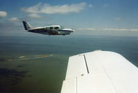N2257L - over Tangier Island VA -1978 - by R. Morris